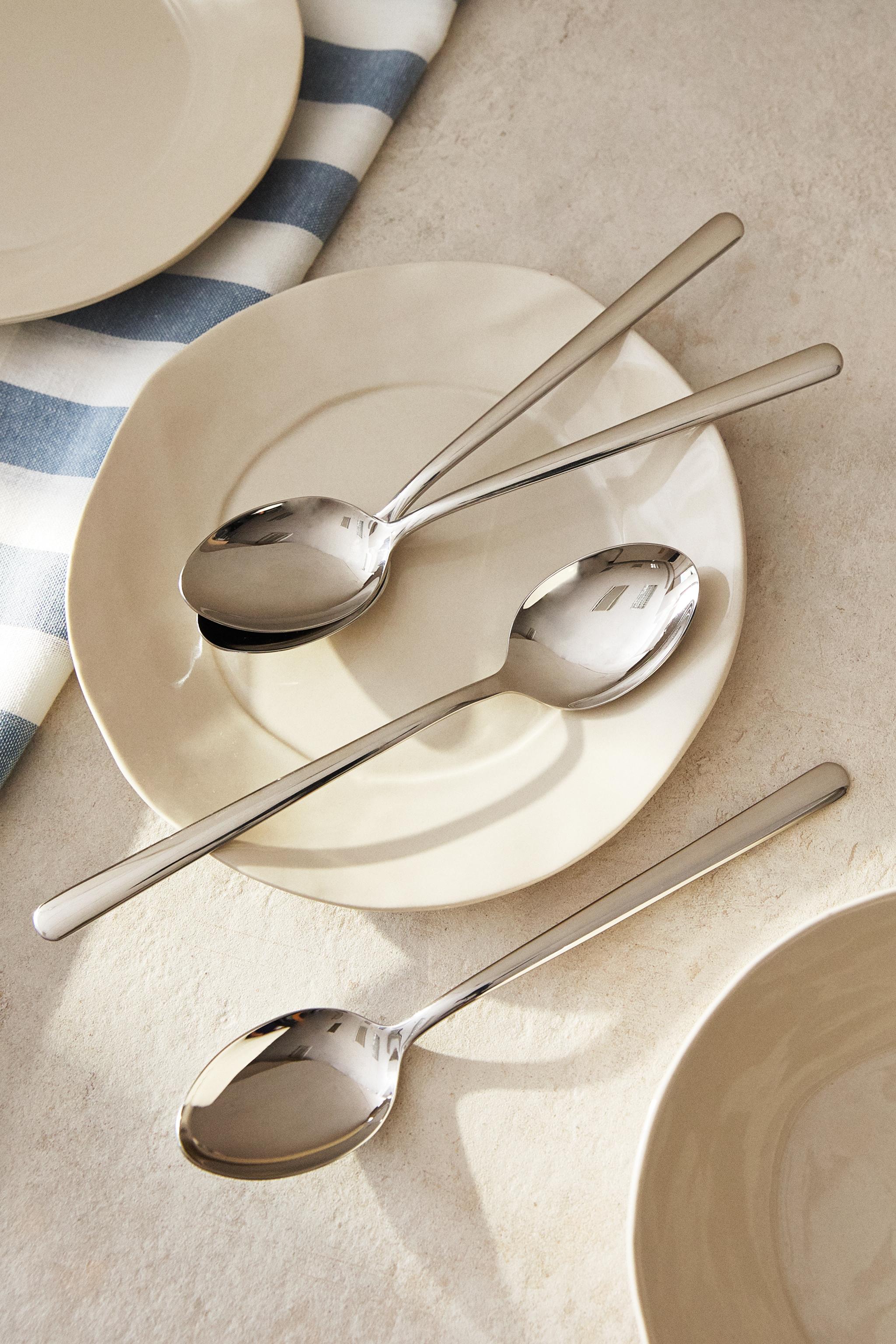 SET OF SHINY STEEL SPOONS (SET OF 4)
