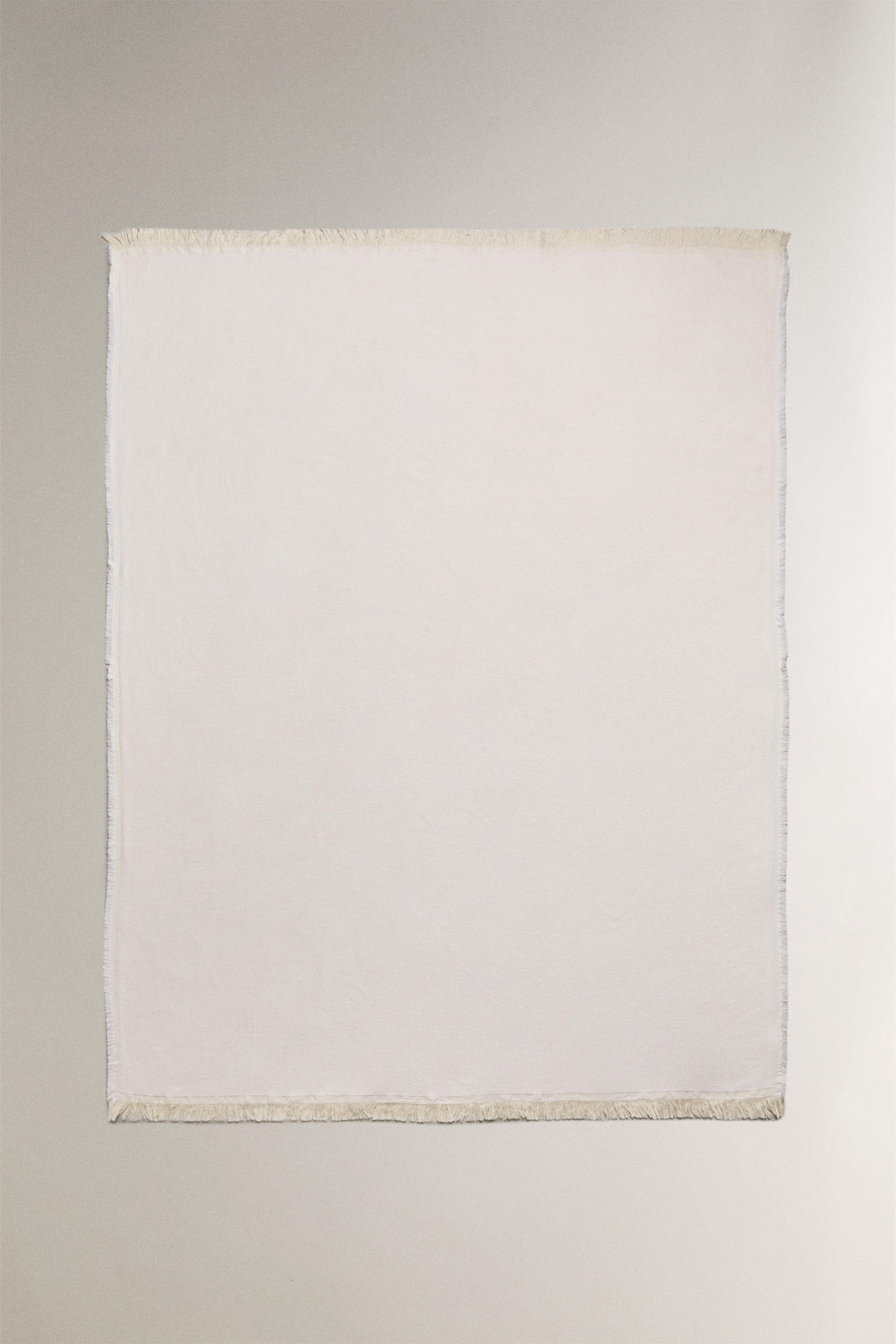 DECORATIVE FRINGED BLANKET