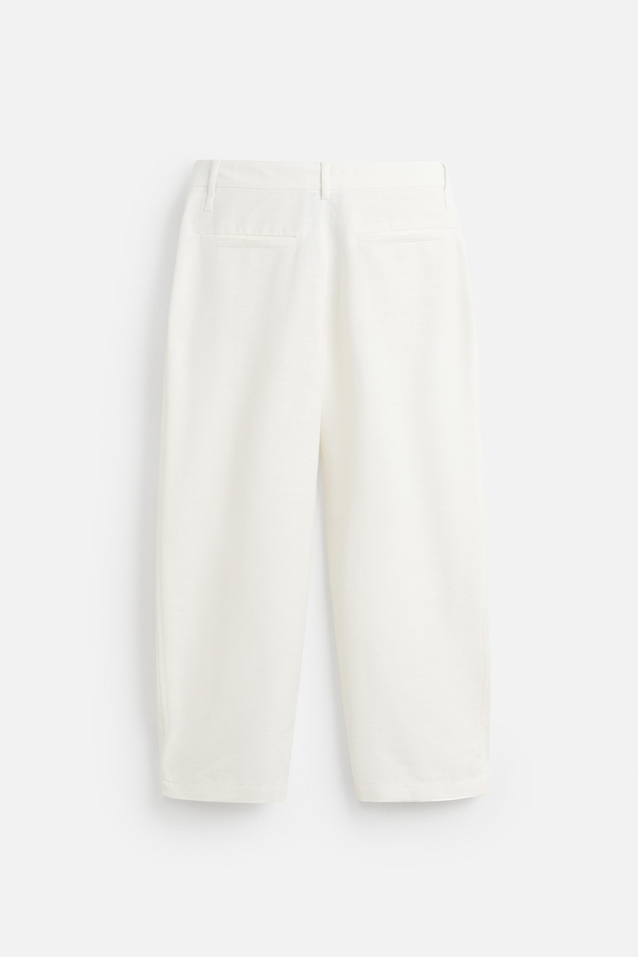 PLEATED RELAXED FIT PANTS