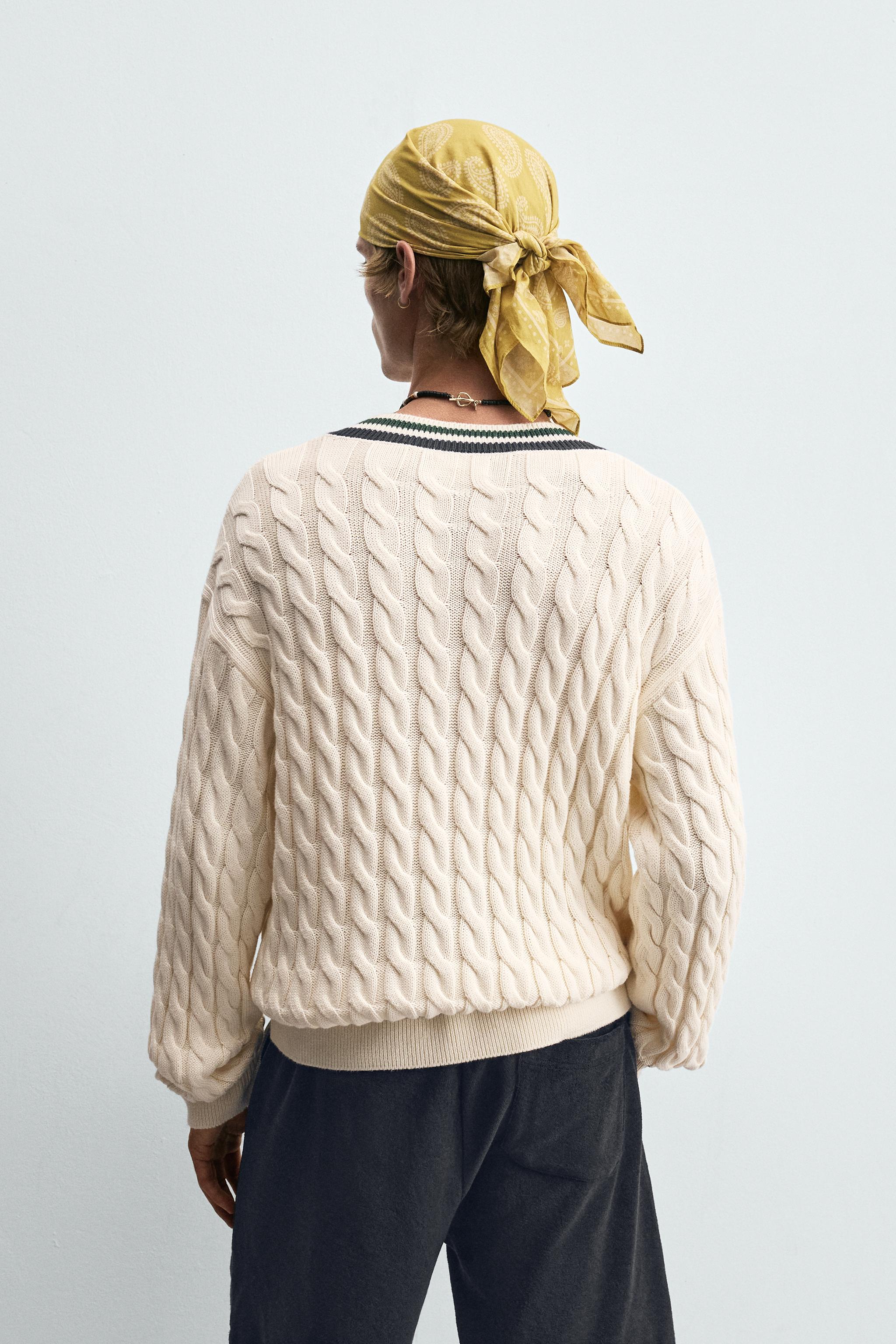 CABLE KNIT SWEATER