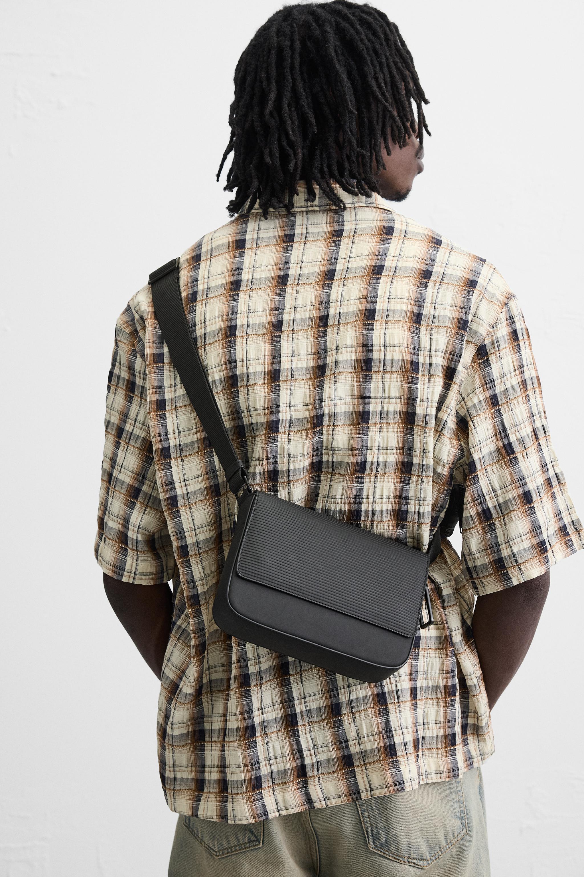 TEXTURED RUBBERIZED CROSSBODY BAG