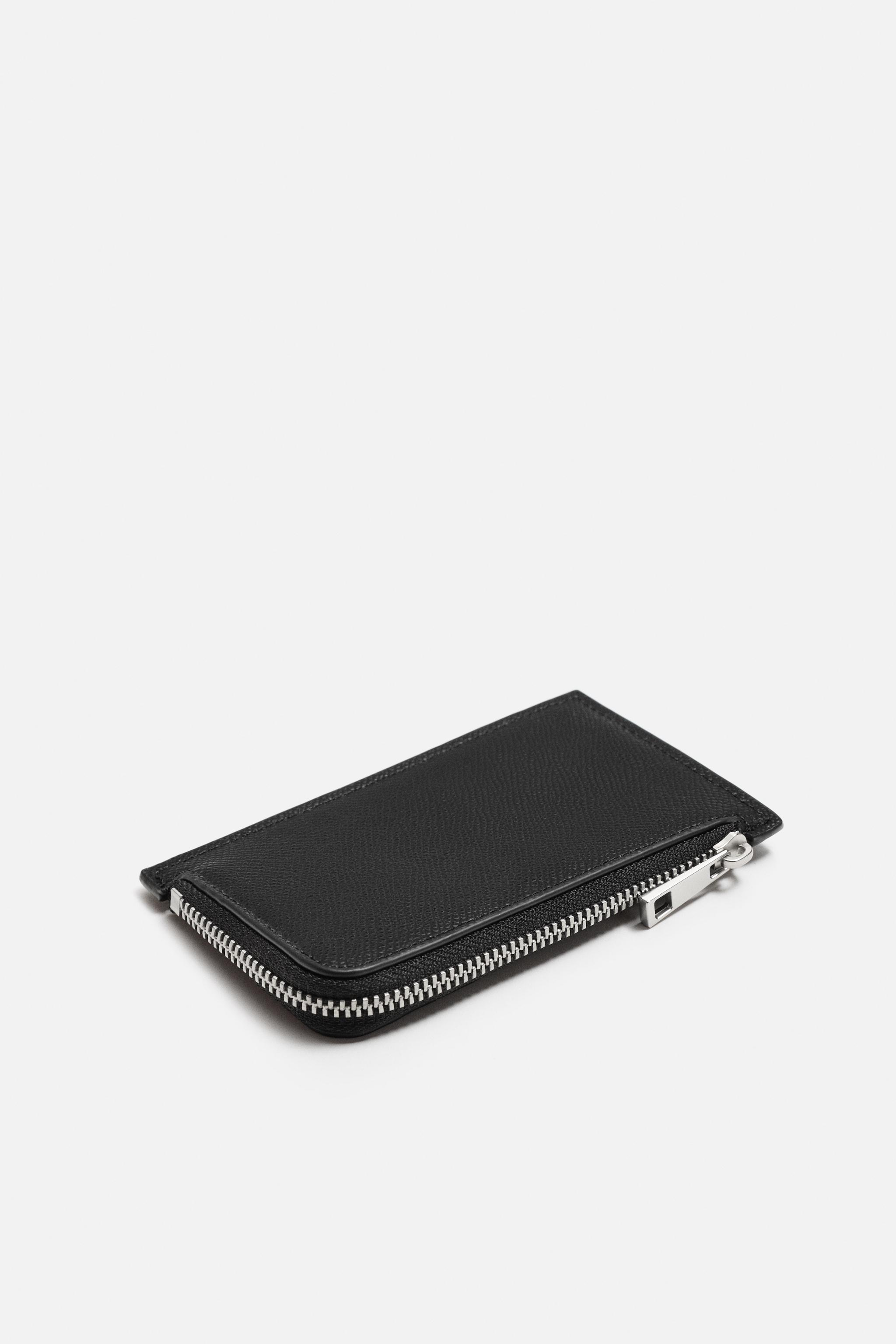 EMBOSSED CARDHOLDER