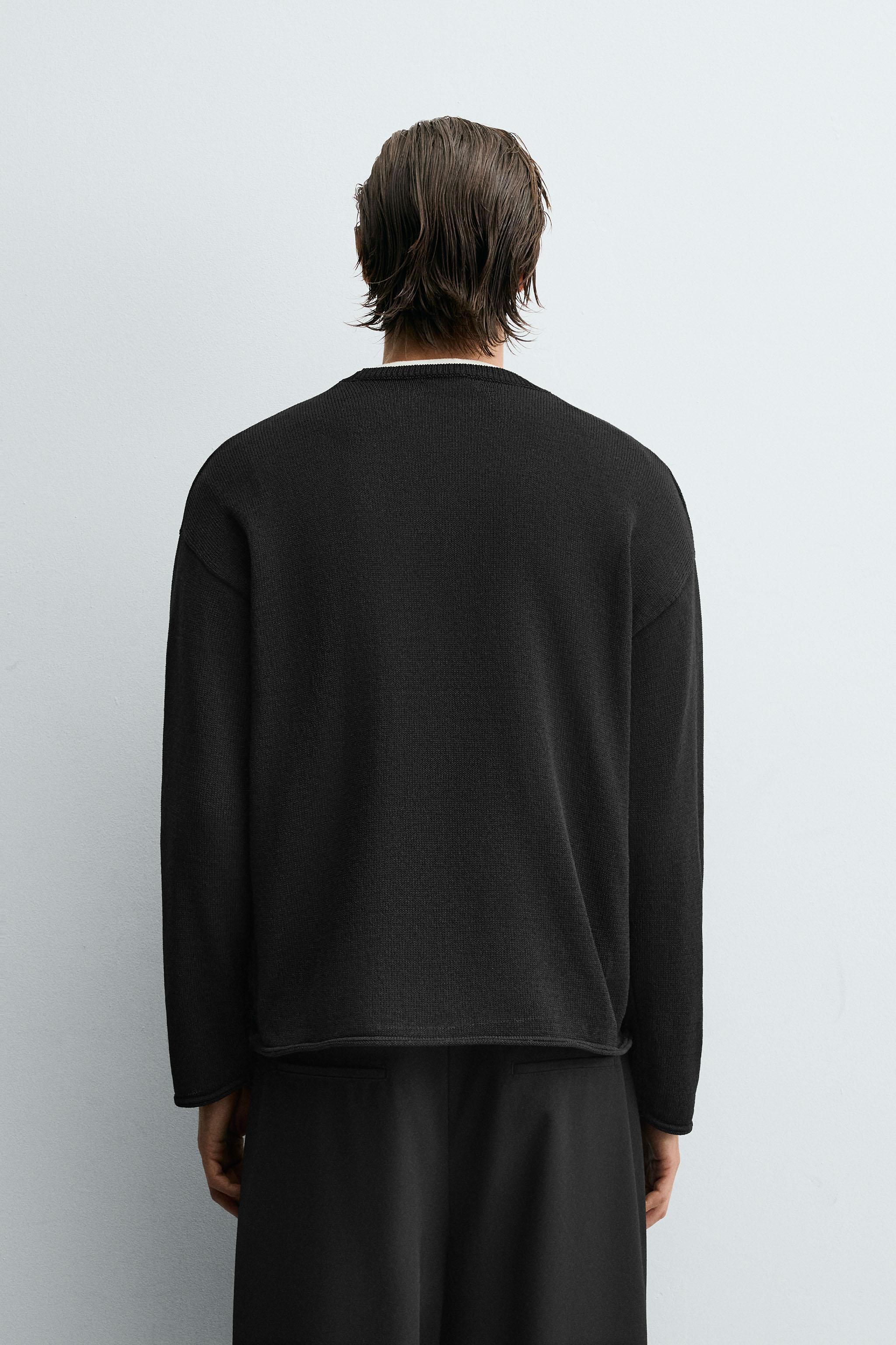 TEXTURED KNIT SWEATER WITH ROLLED TRIM