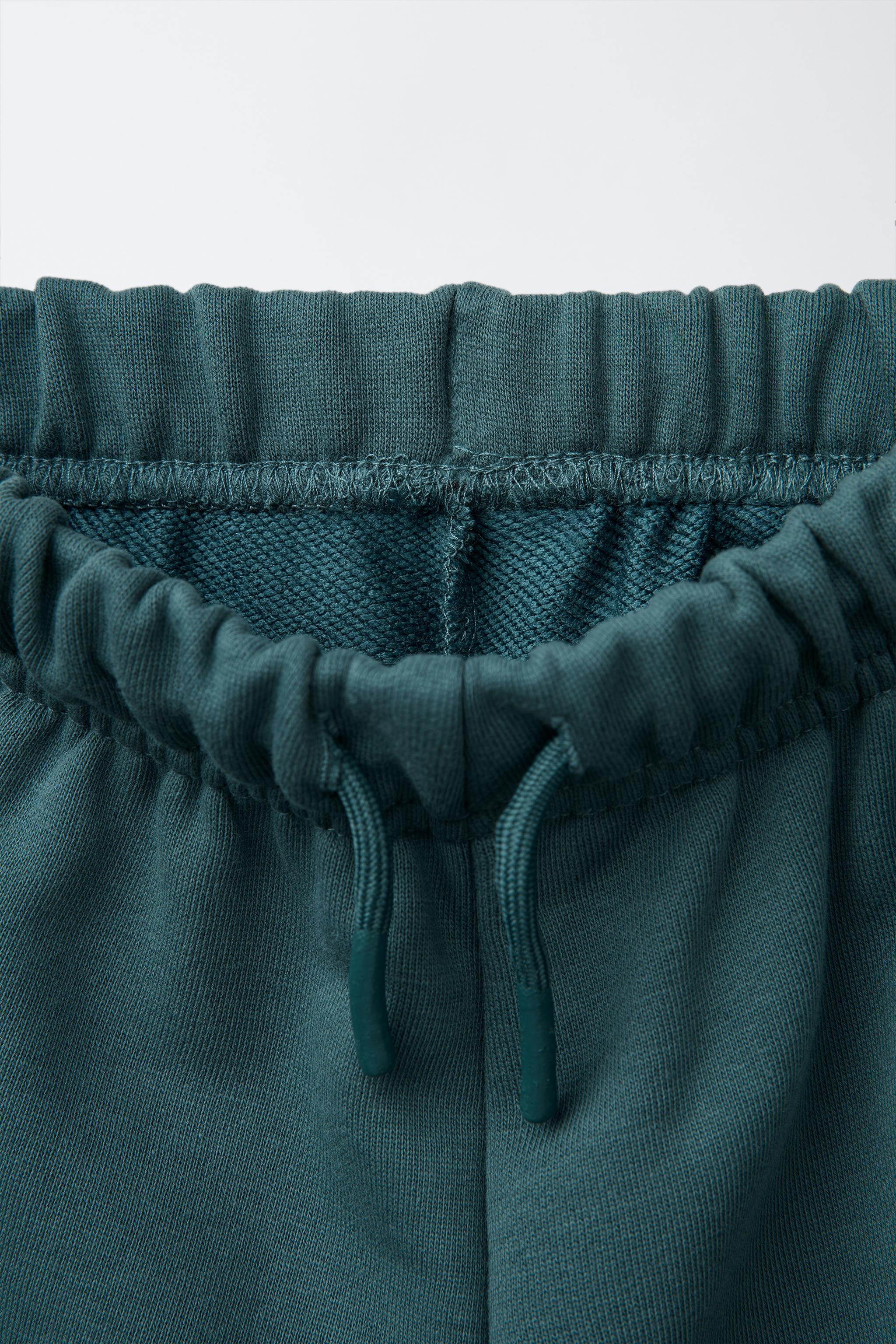 CUT-OUT JOGGER PANTS