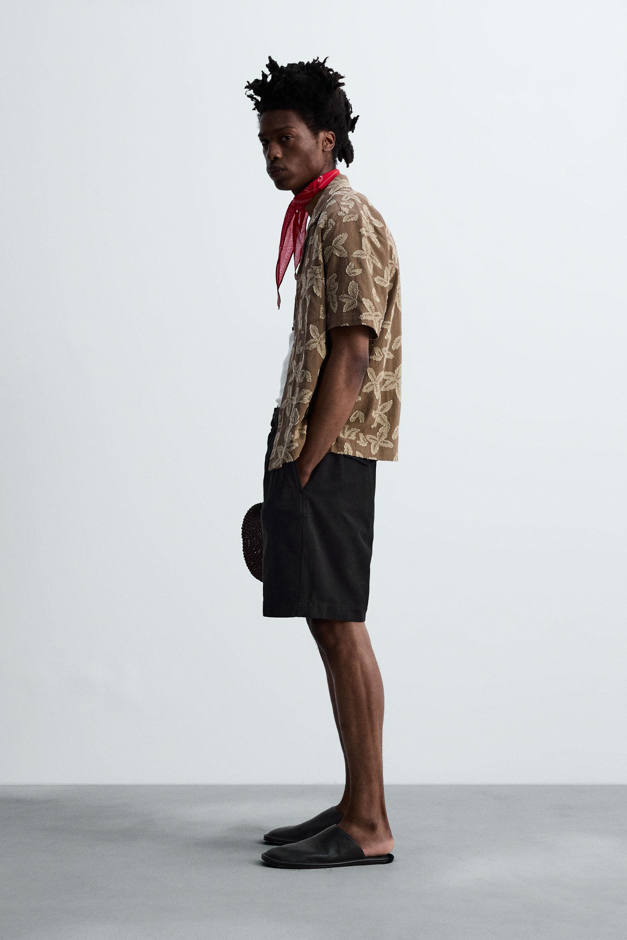 RELAXED FIT PLEATED BERMUDA SHORTS