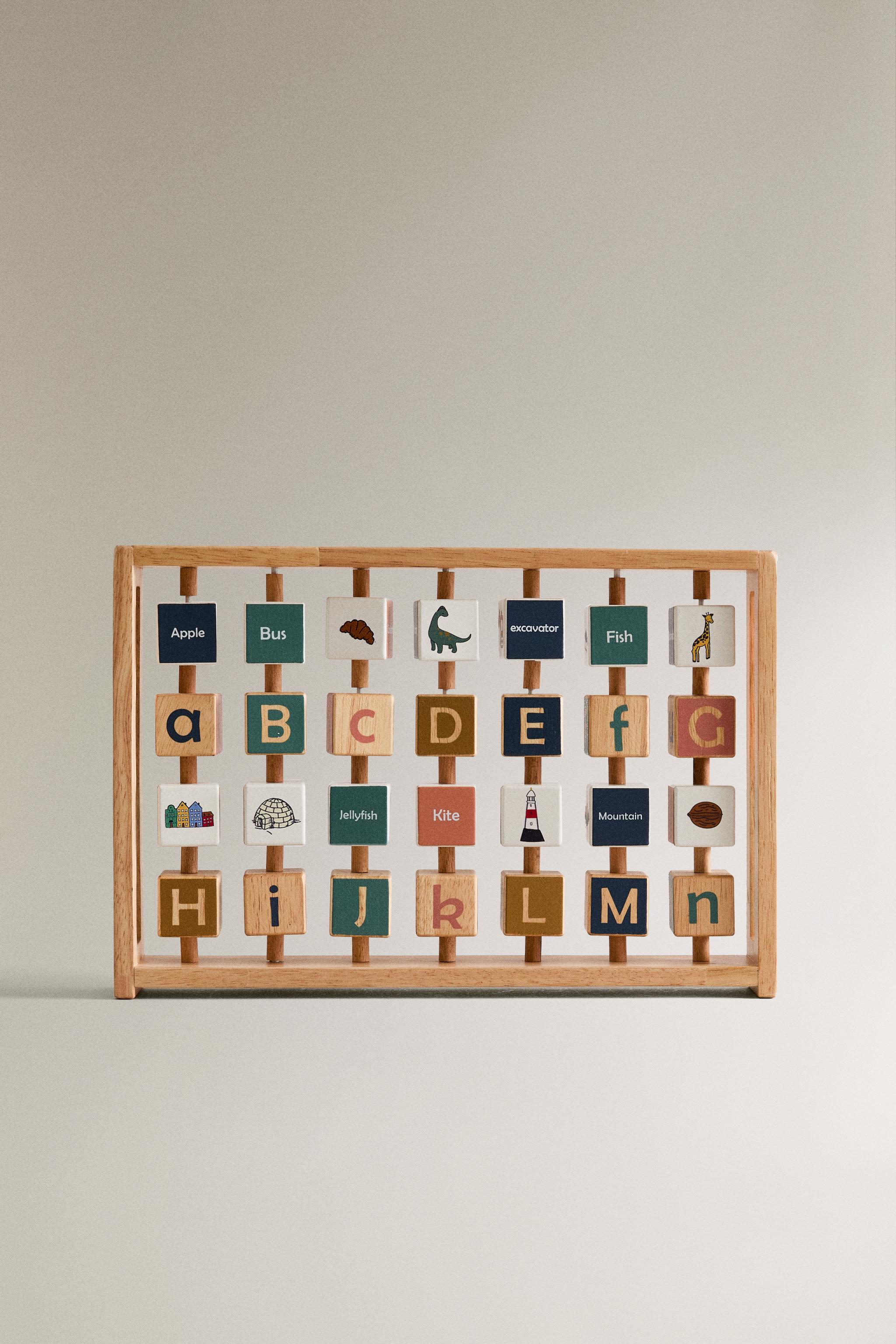 CHILDREN’S WOODEN ALPHABET TOY