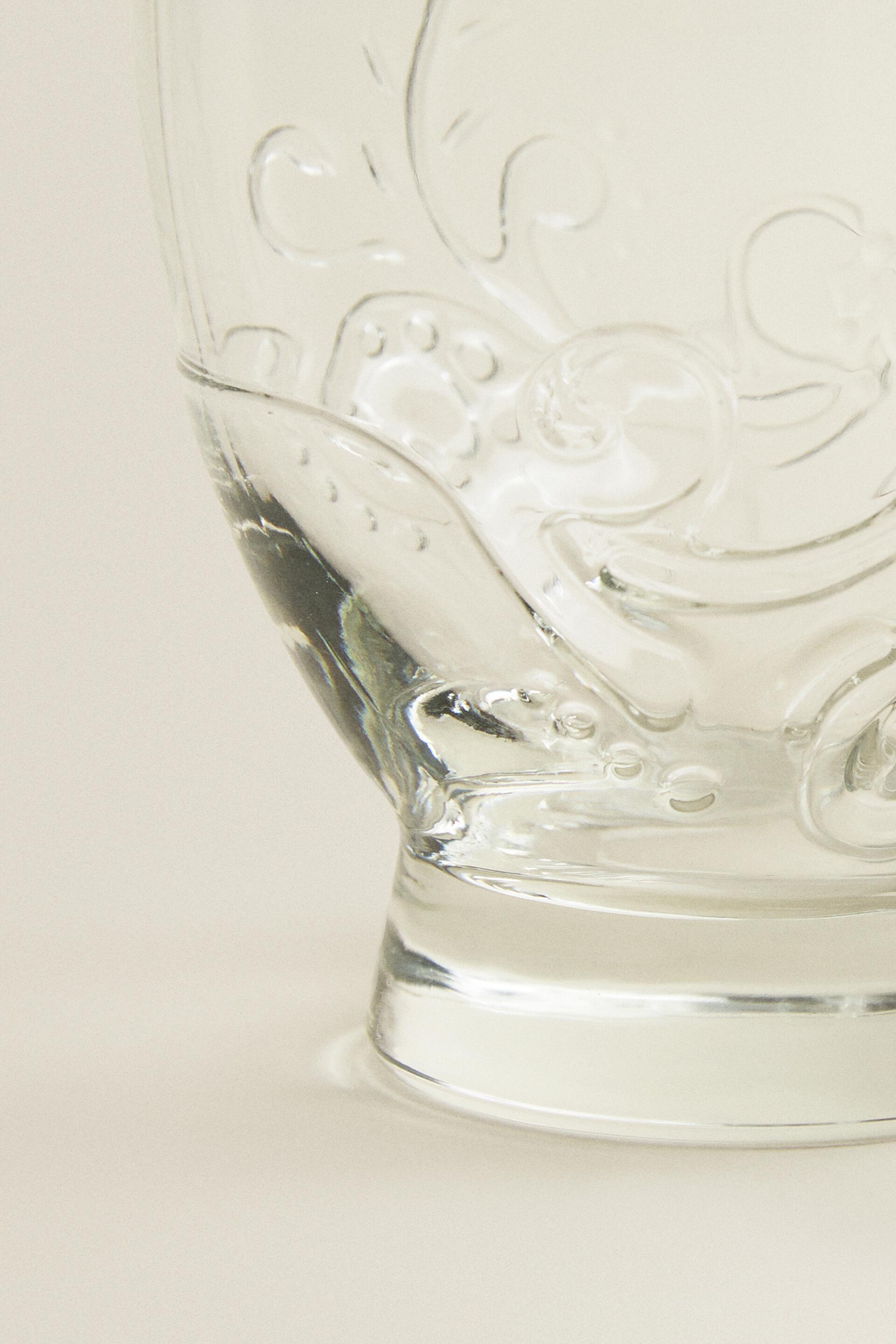 RAISED FLORAL DESIGN GLASS TUMBLER