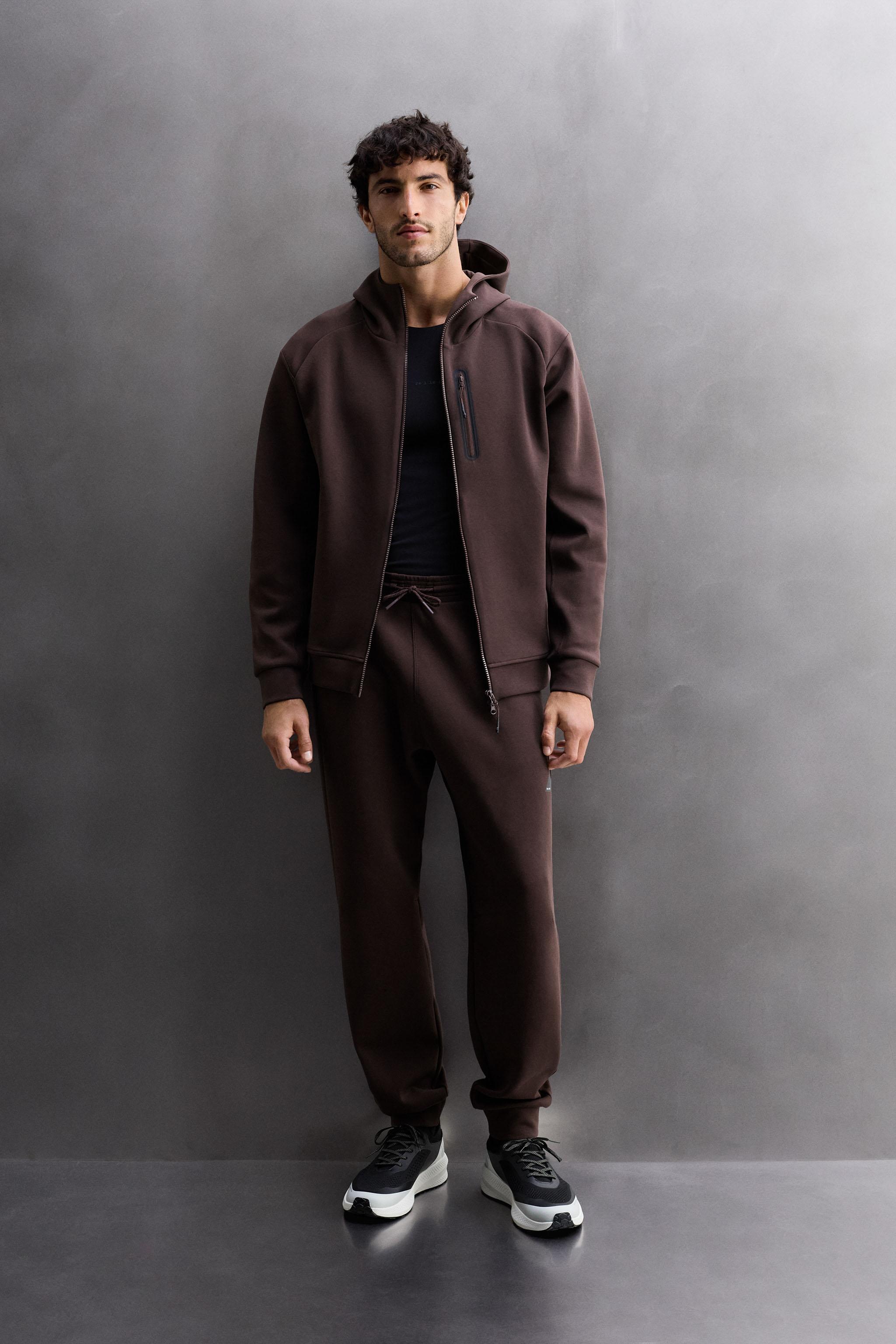 TECHNICAL ZIP-UP HOODIE