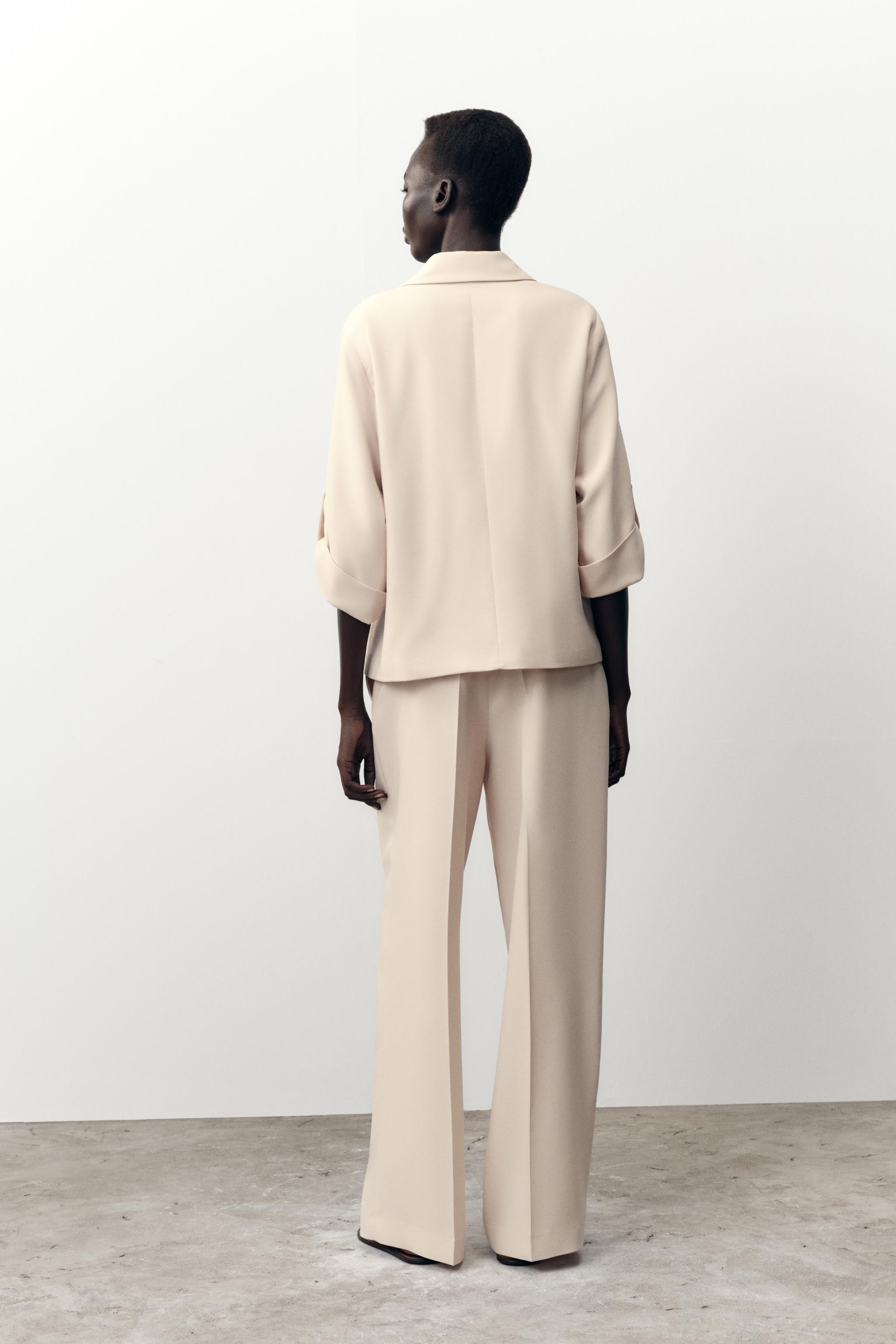 DOUBLE BREASTED BLAZER WITH TABBED SLEEVES