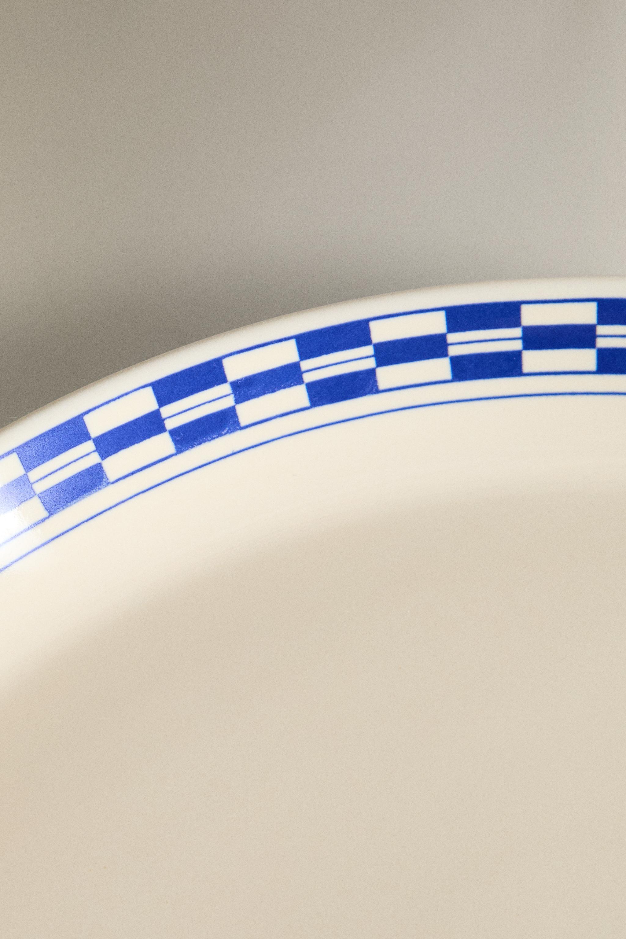 CERAMIC DINNER PLATE WITH CHECKED RIM
