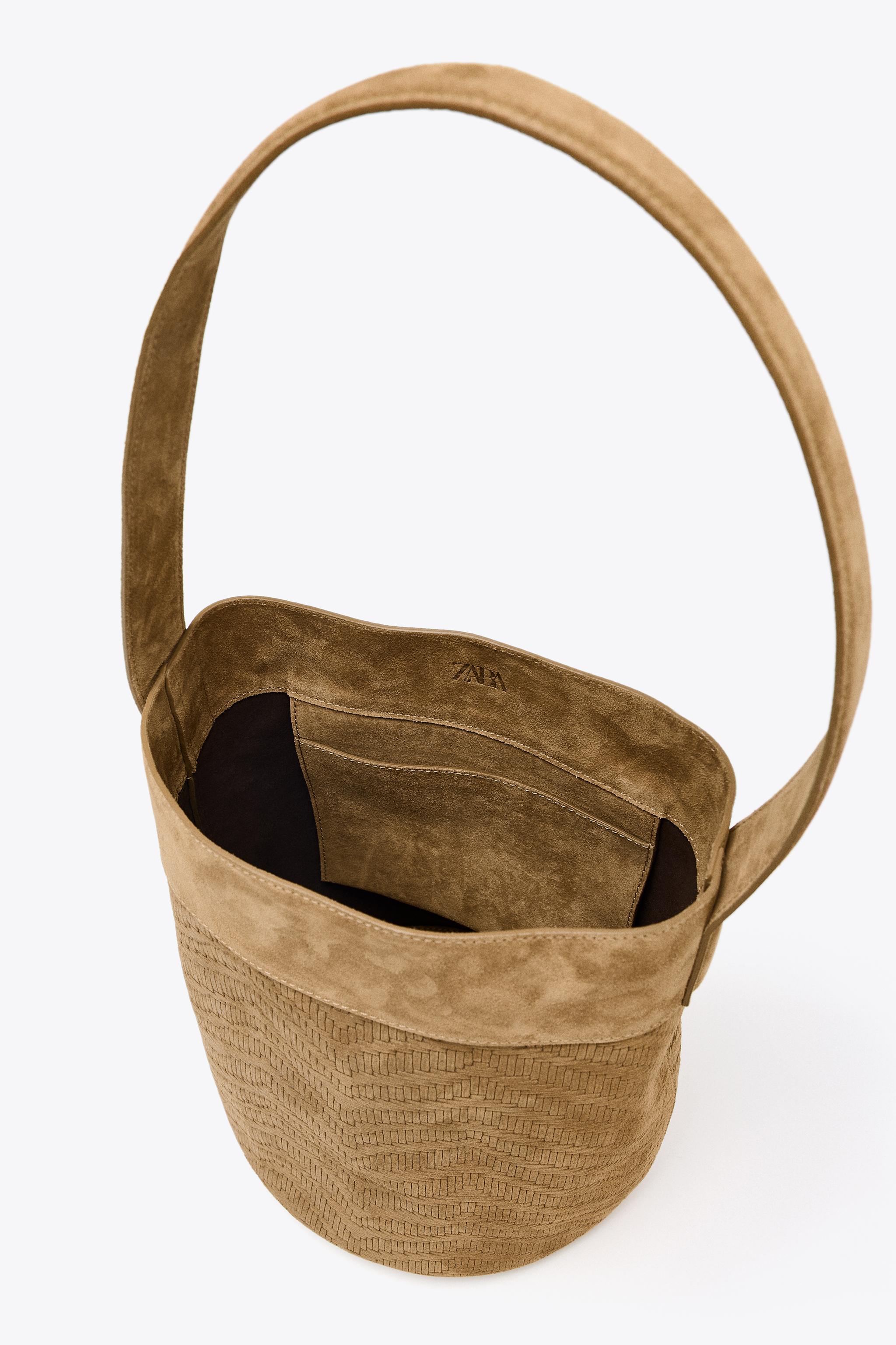 LEATHER BRAIDED MAXI BUCKET BAG