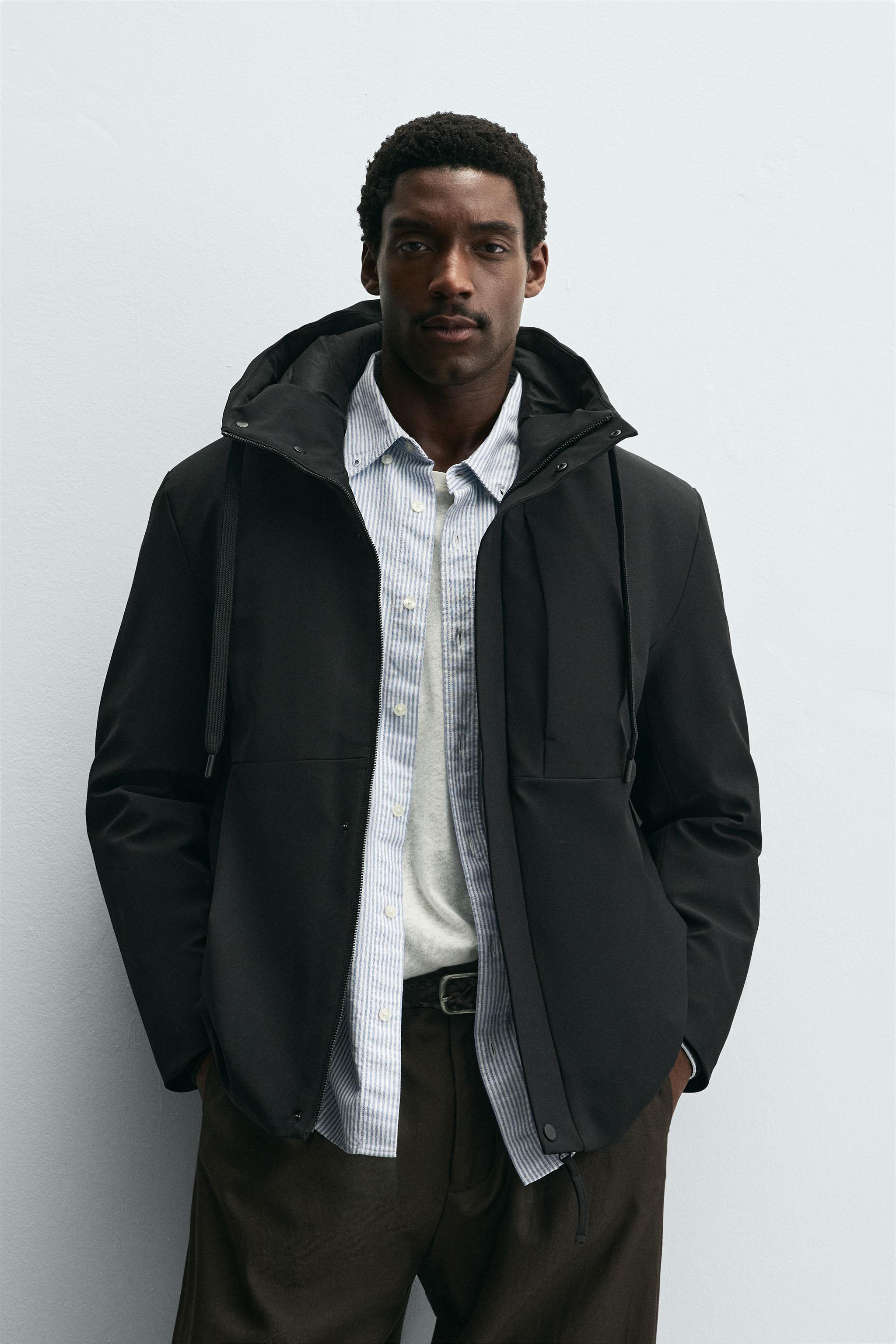 HOODED TECHNICAL JACKET