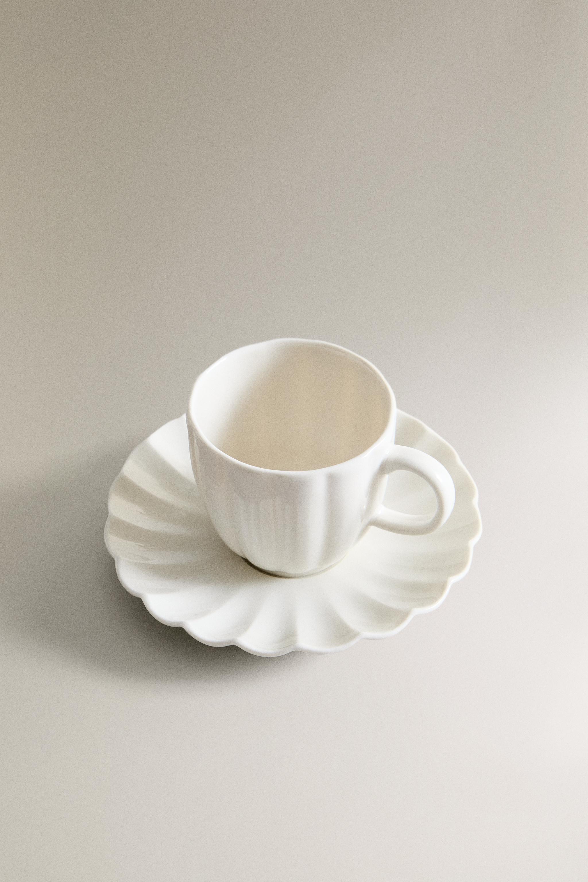 SCALLOPED PORCELAIN MUG AND SAUCER