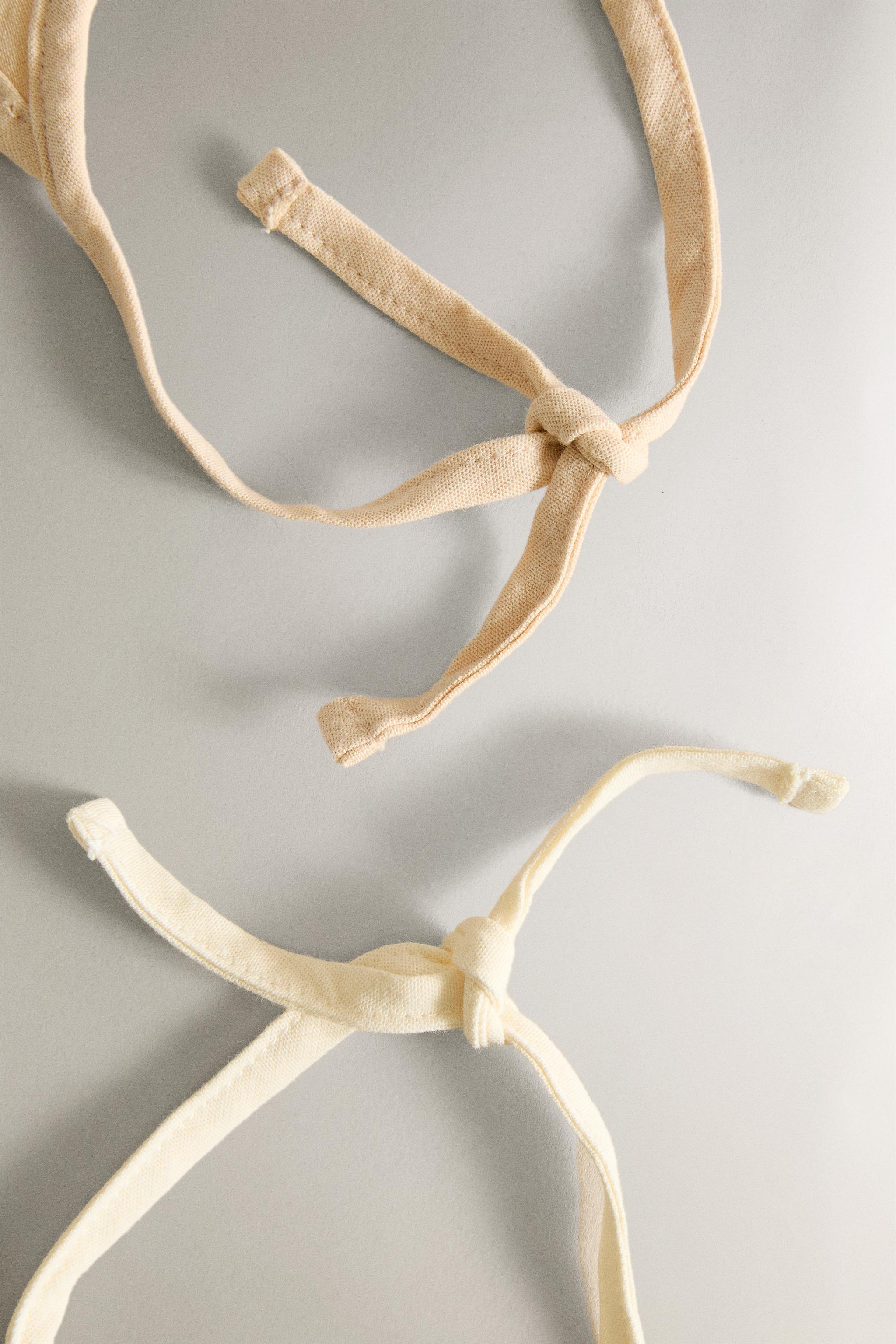 CHILDREN'S BIB WITH MINI FLOWERS (SET OF 2)