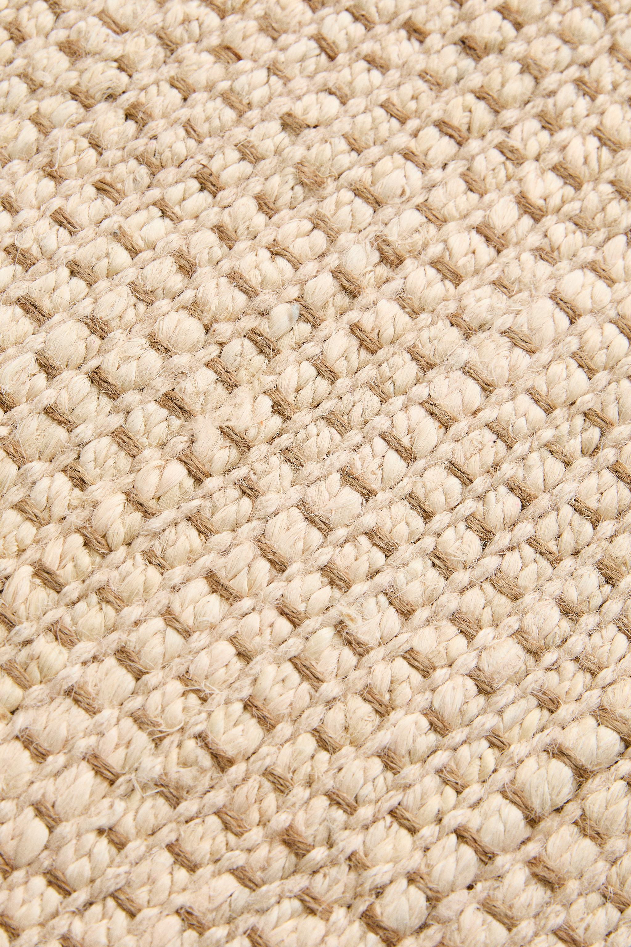 WOVEN JUTE AREA RUG