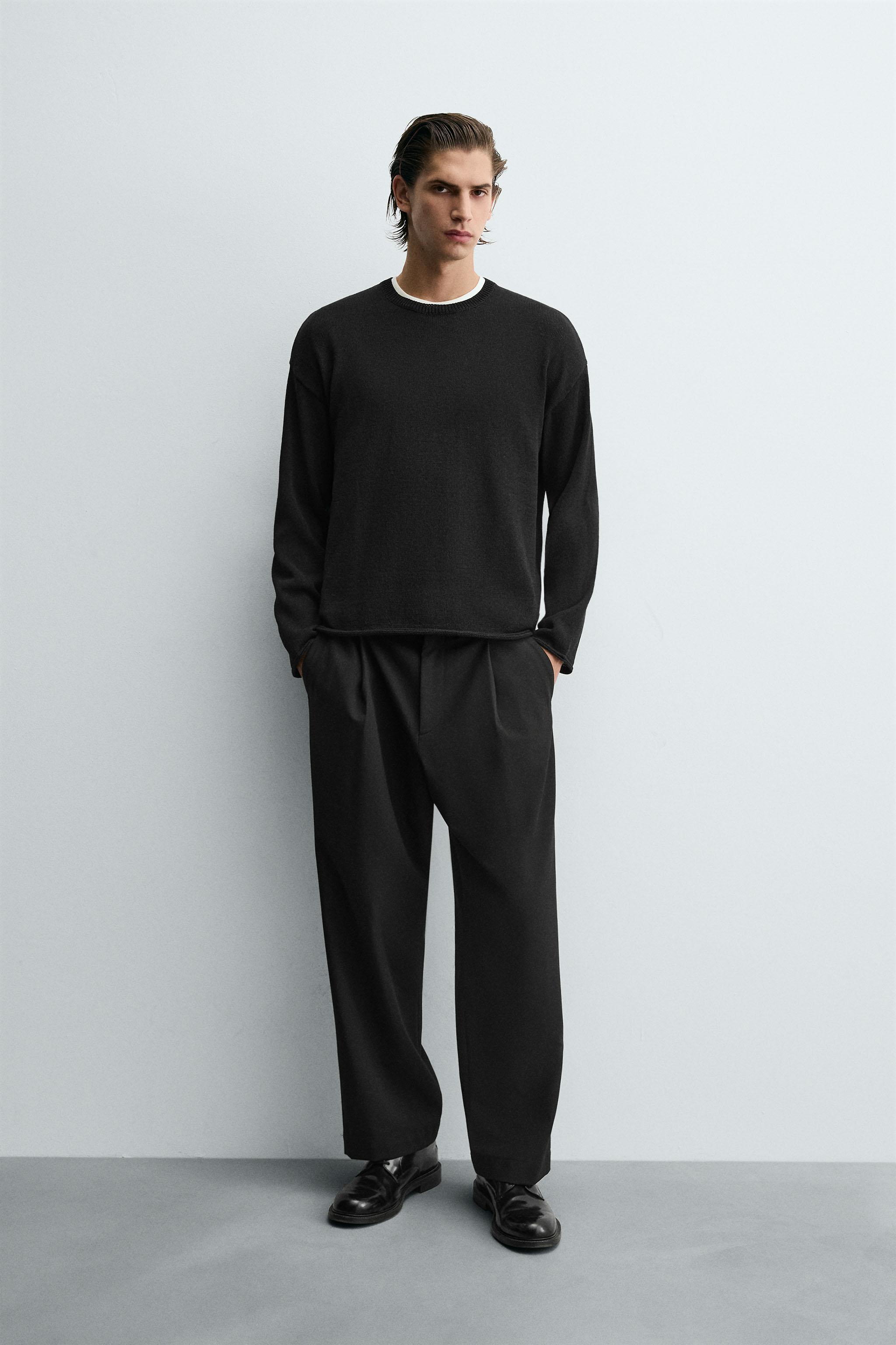 TEXTURED KNIT SWEATER WITH ROLLED TRIM