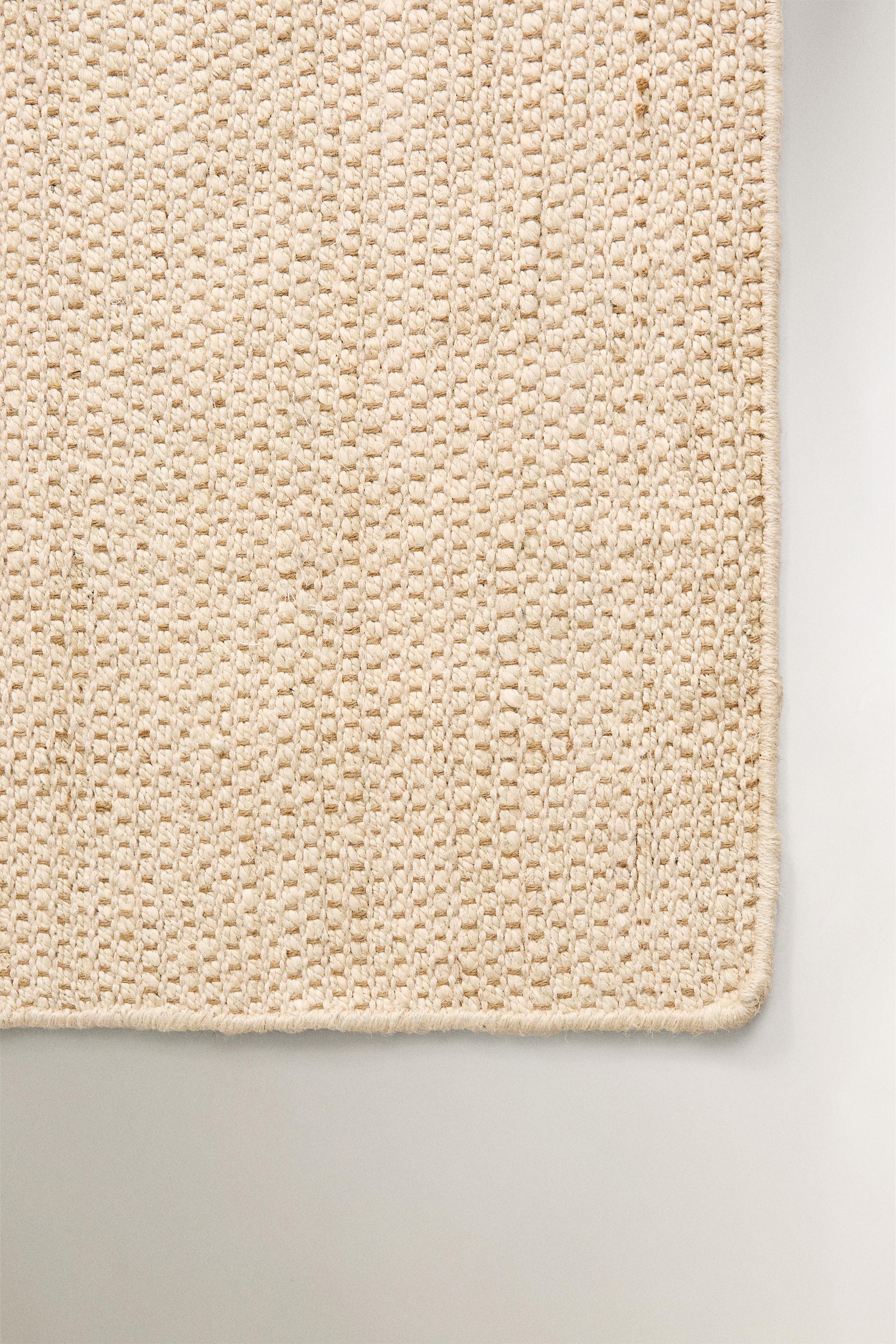 WOVEN JUTE AREA RUG