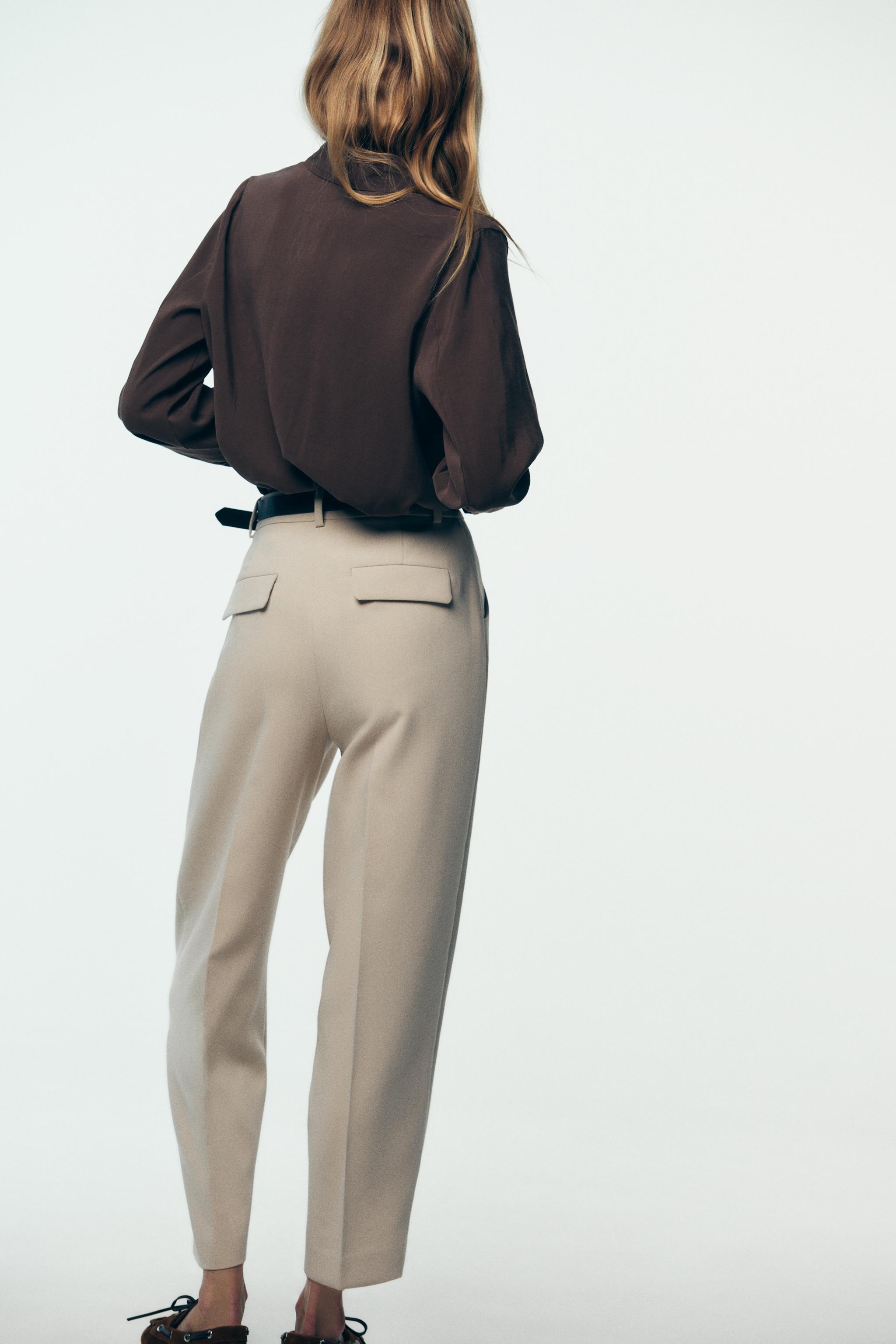 BELTED PLEATED PANTS