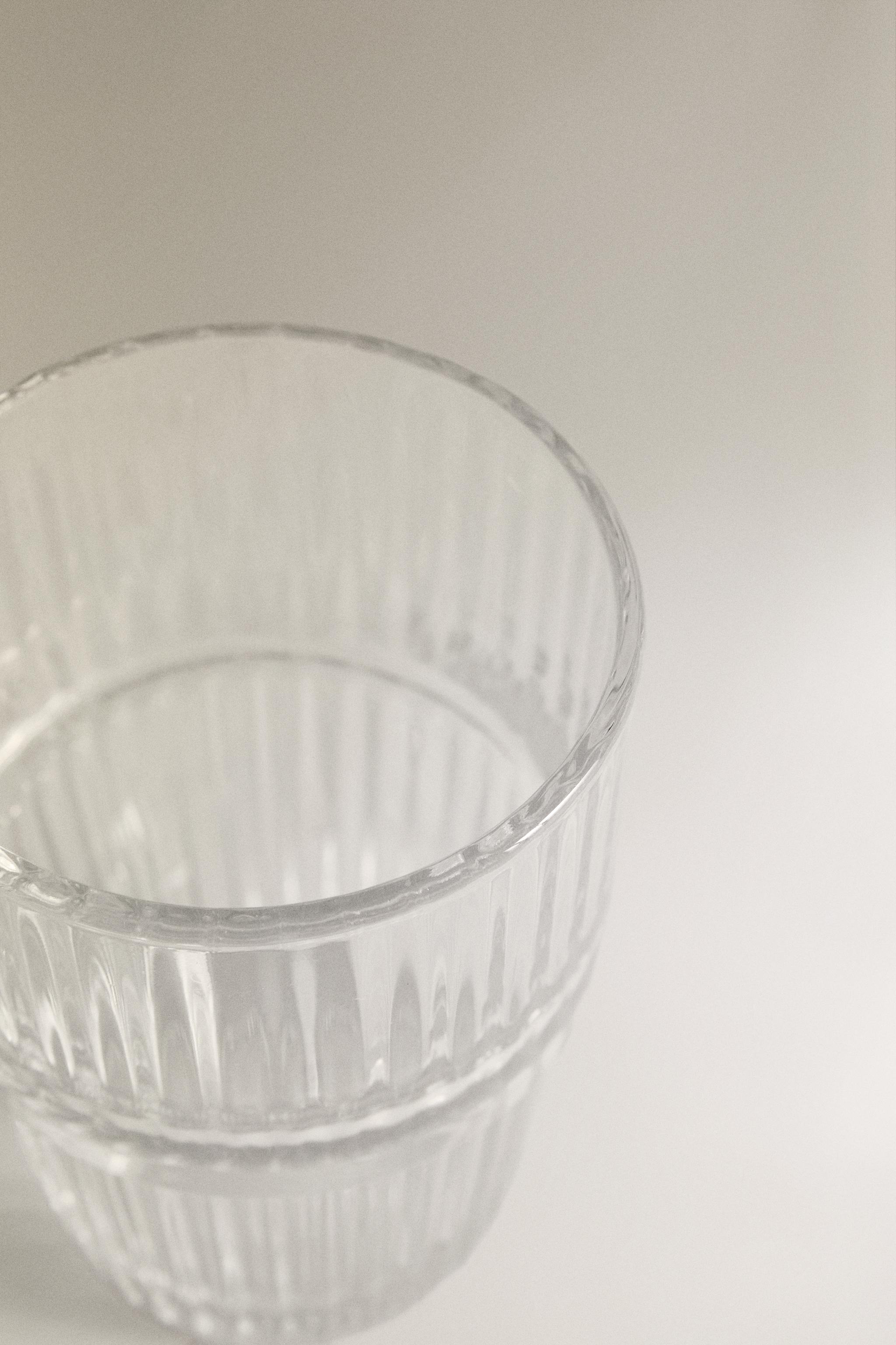 GLASS MUG WITH A RAISED DESIGN