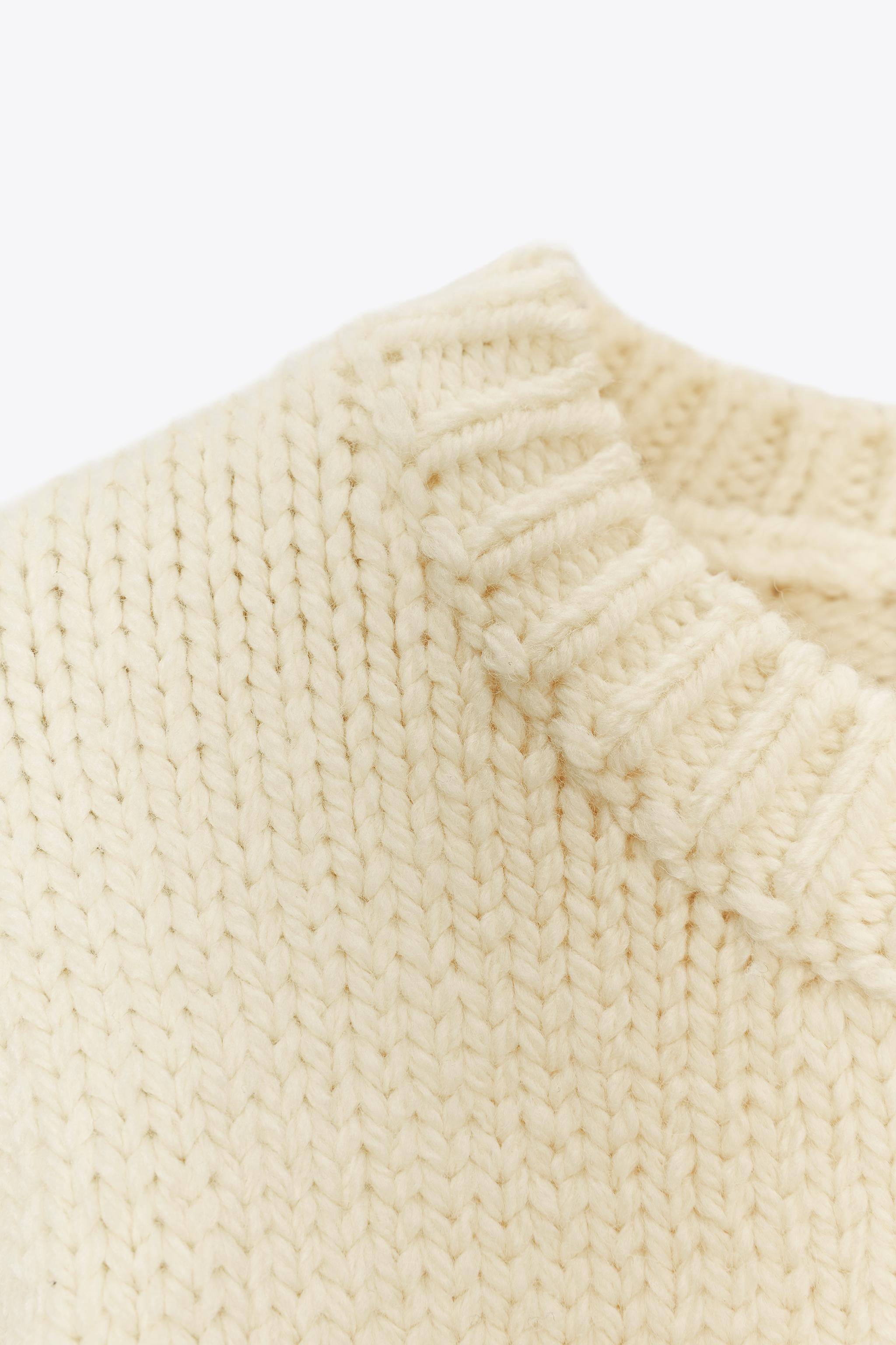 SHORT SLEEVE KNIT SWEATER