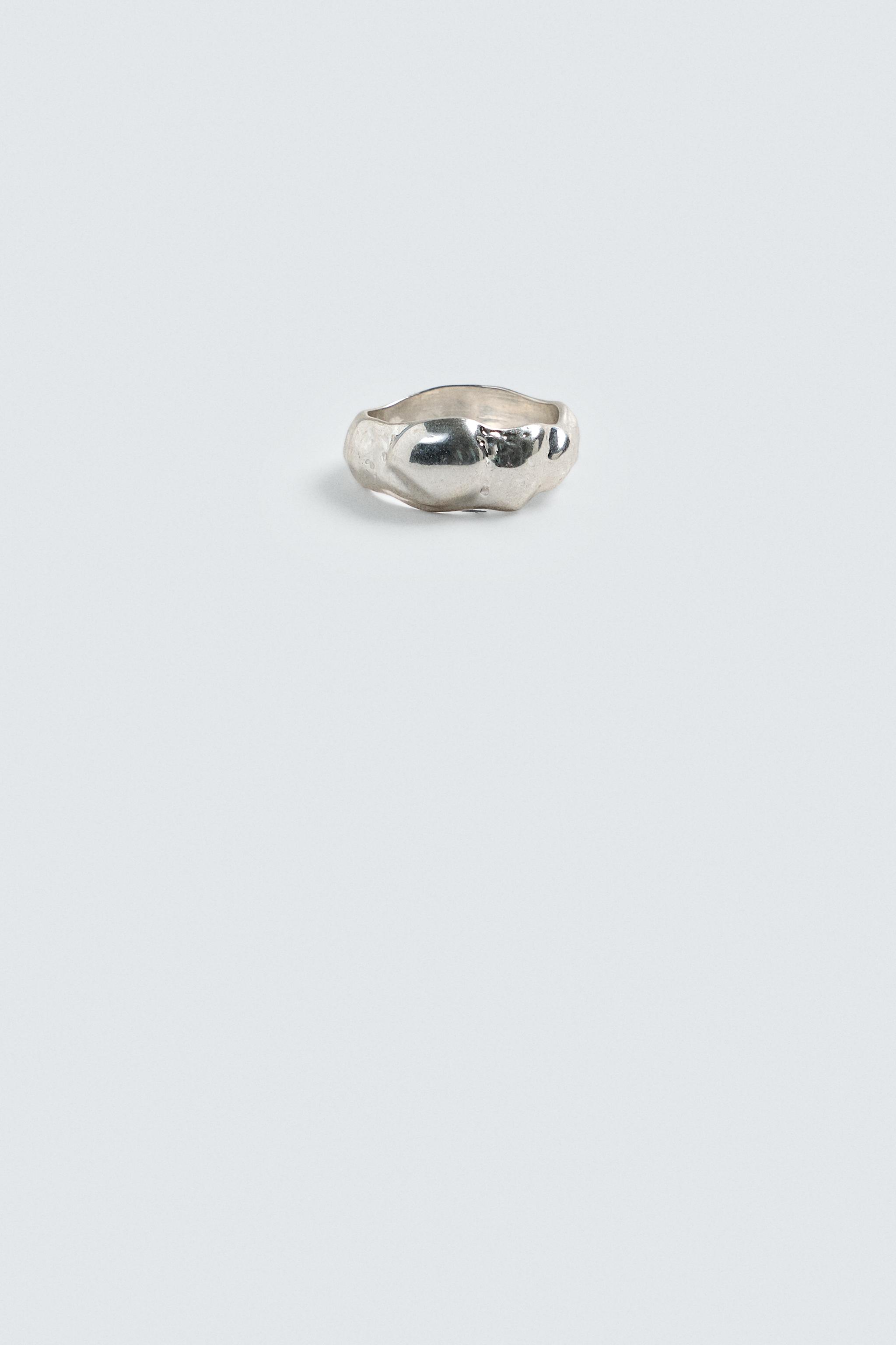IRREGULAR METAL RING