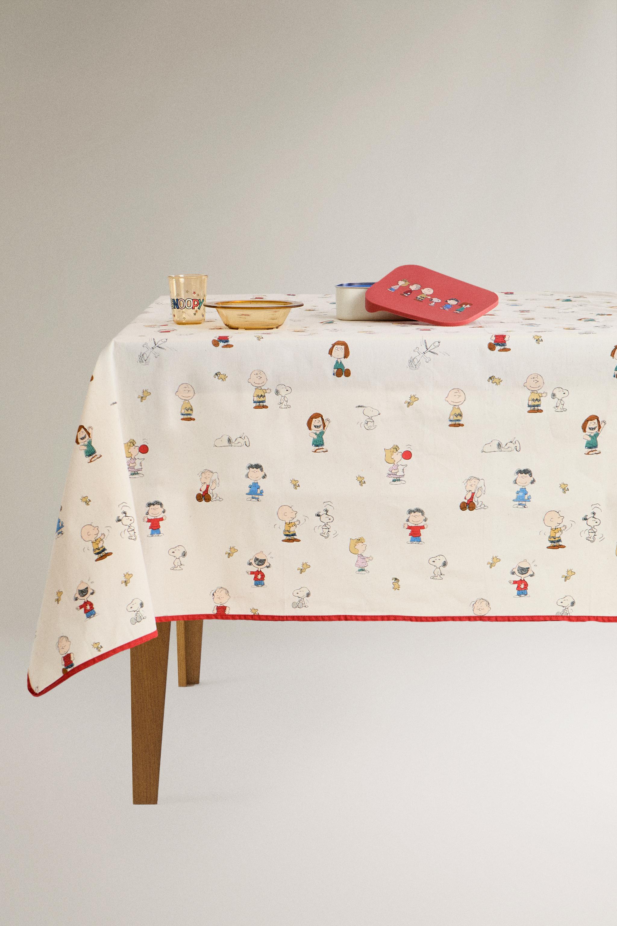 CHILDREN’S PEANUTS™ RESIN-COATED TABLECLOTH
