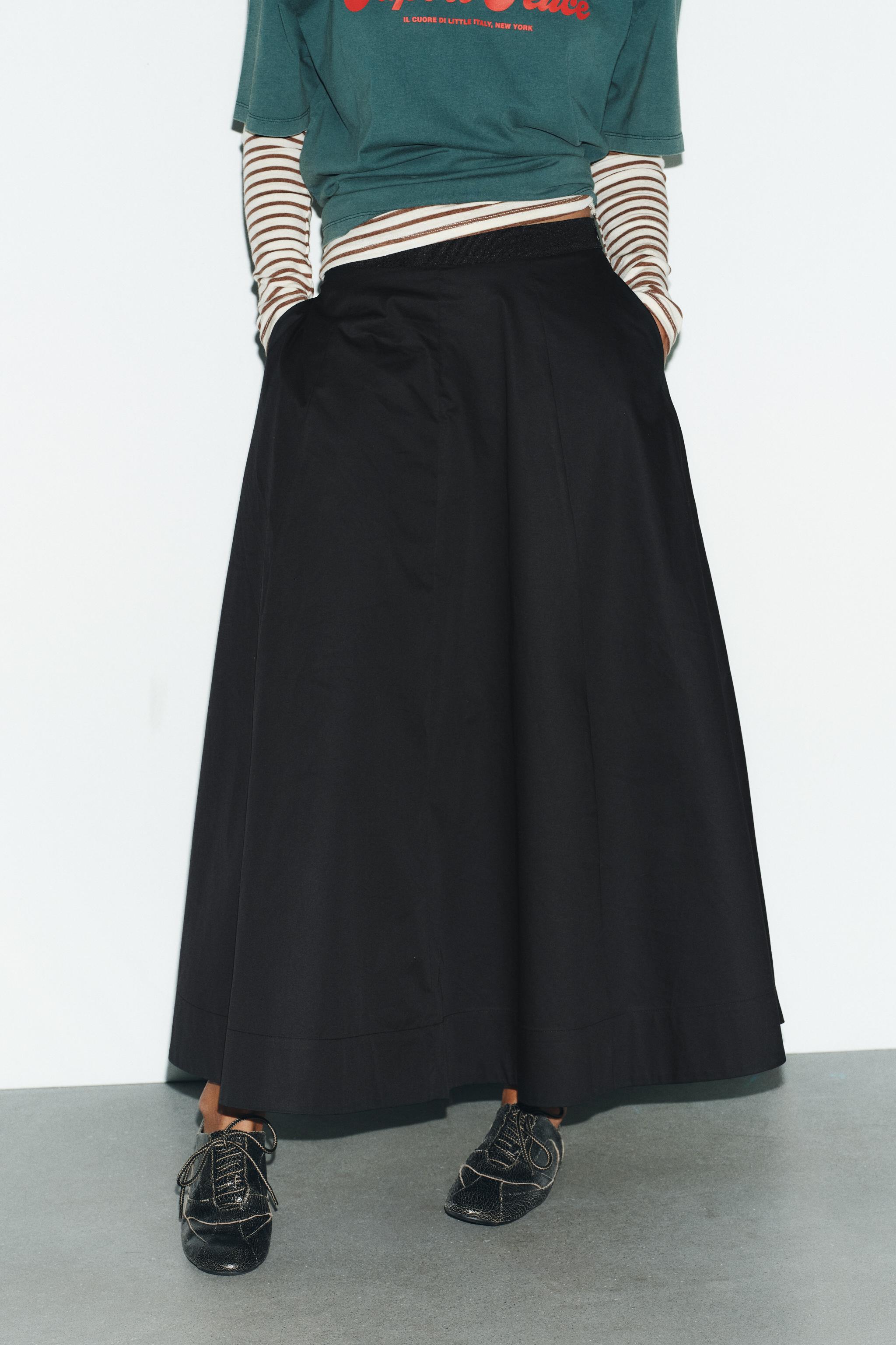 PLEATED MIDI SKIRT