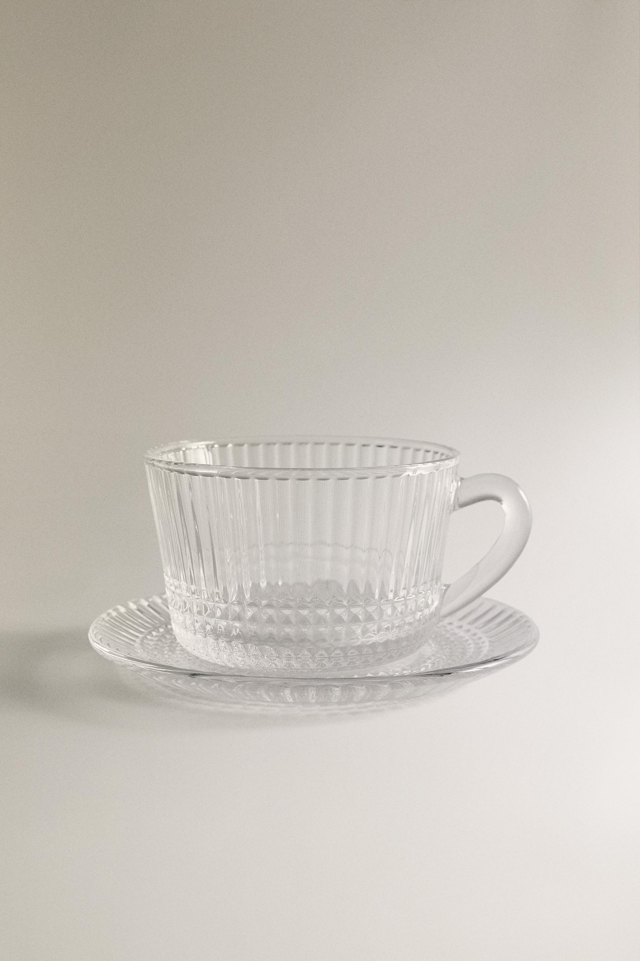 GLASS TEACUP WITH RAISED GEOMETRIC DESIGN