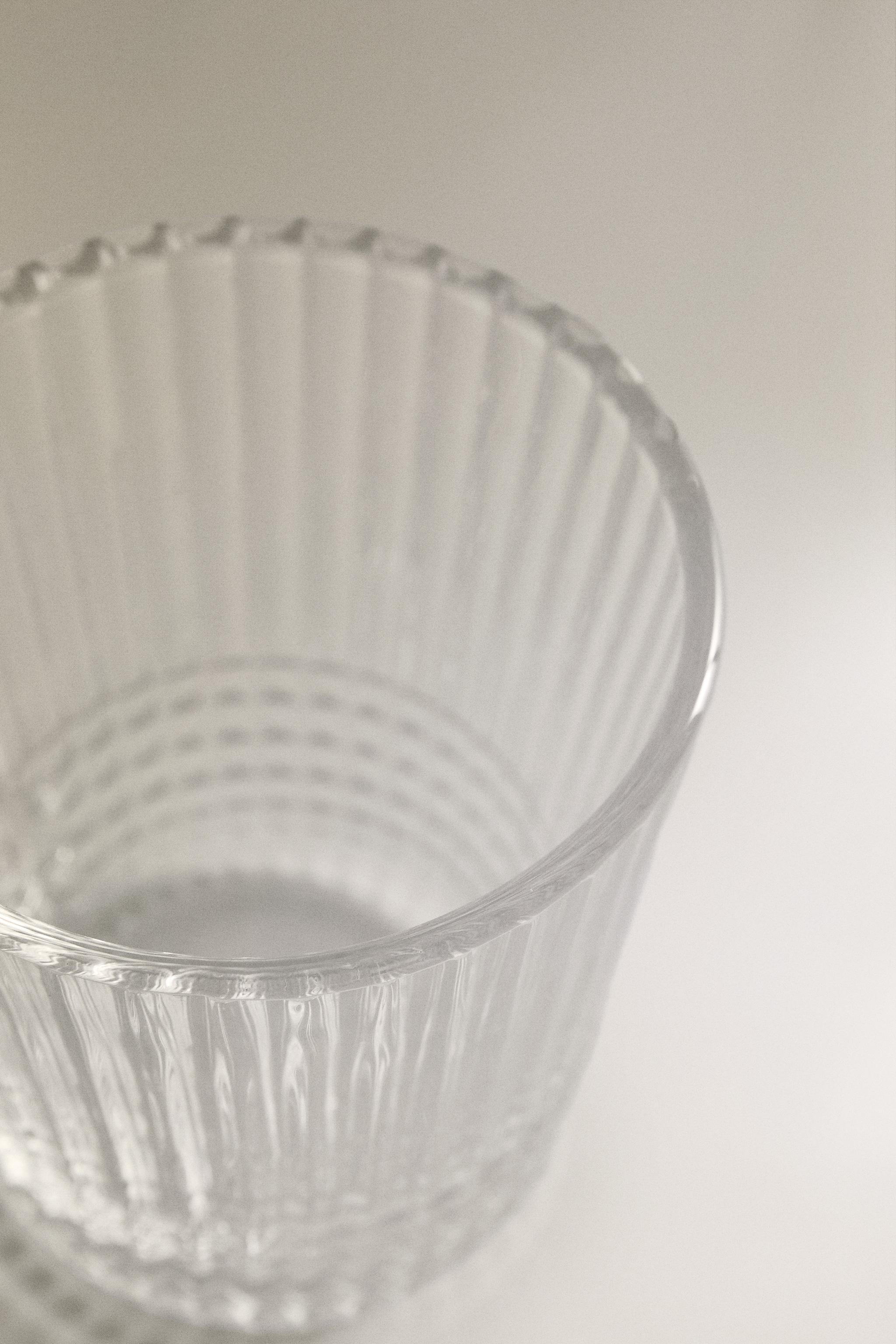 GLASS MUG WITH A RAISED GEOMETRIC DESIGN