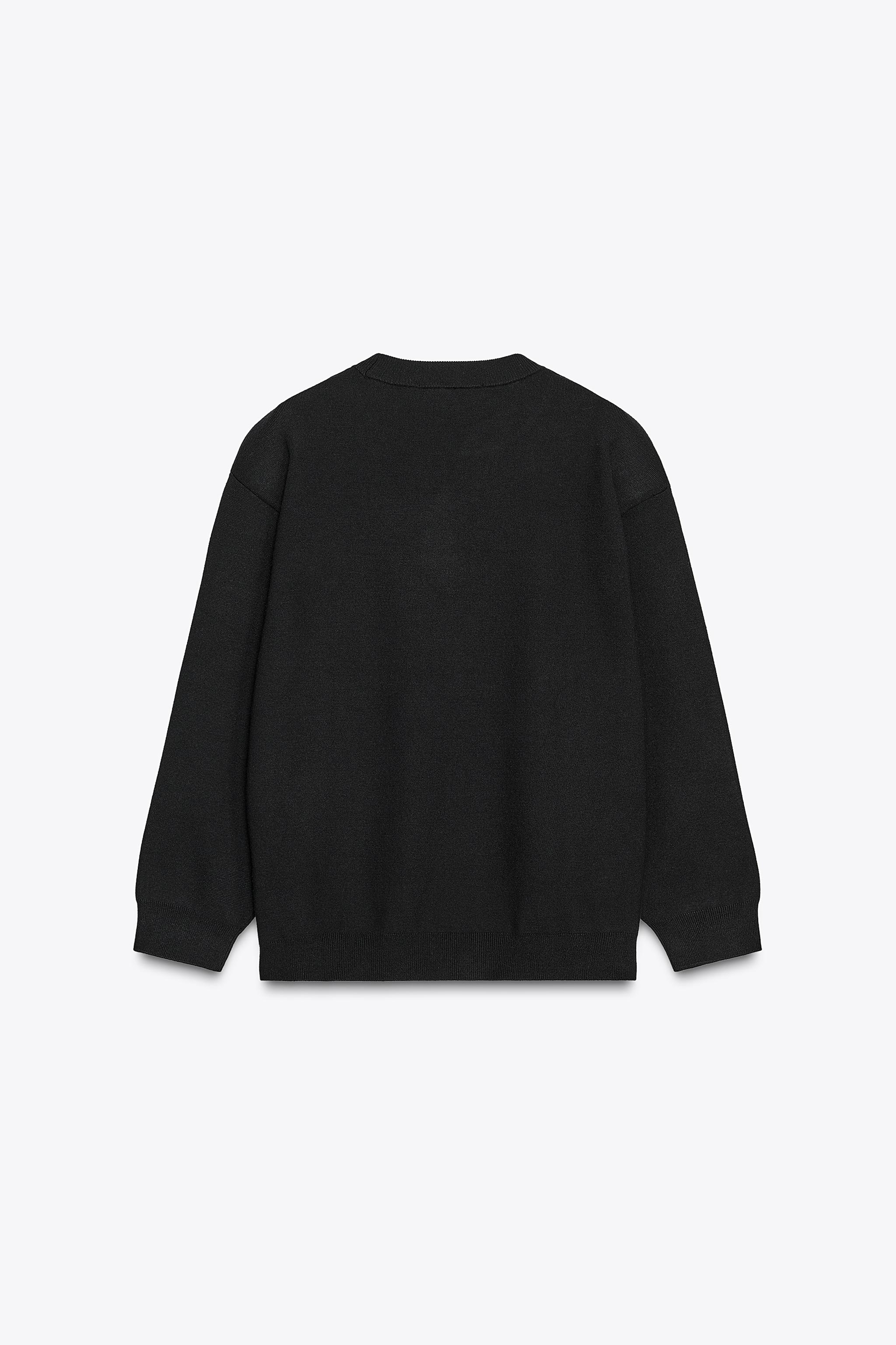 PLAIN KNIT SWEATSHIRT WITH SHOULDER PADS