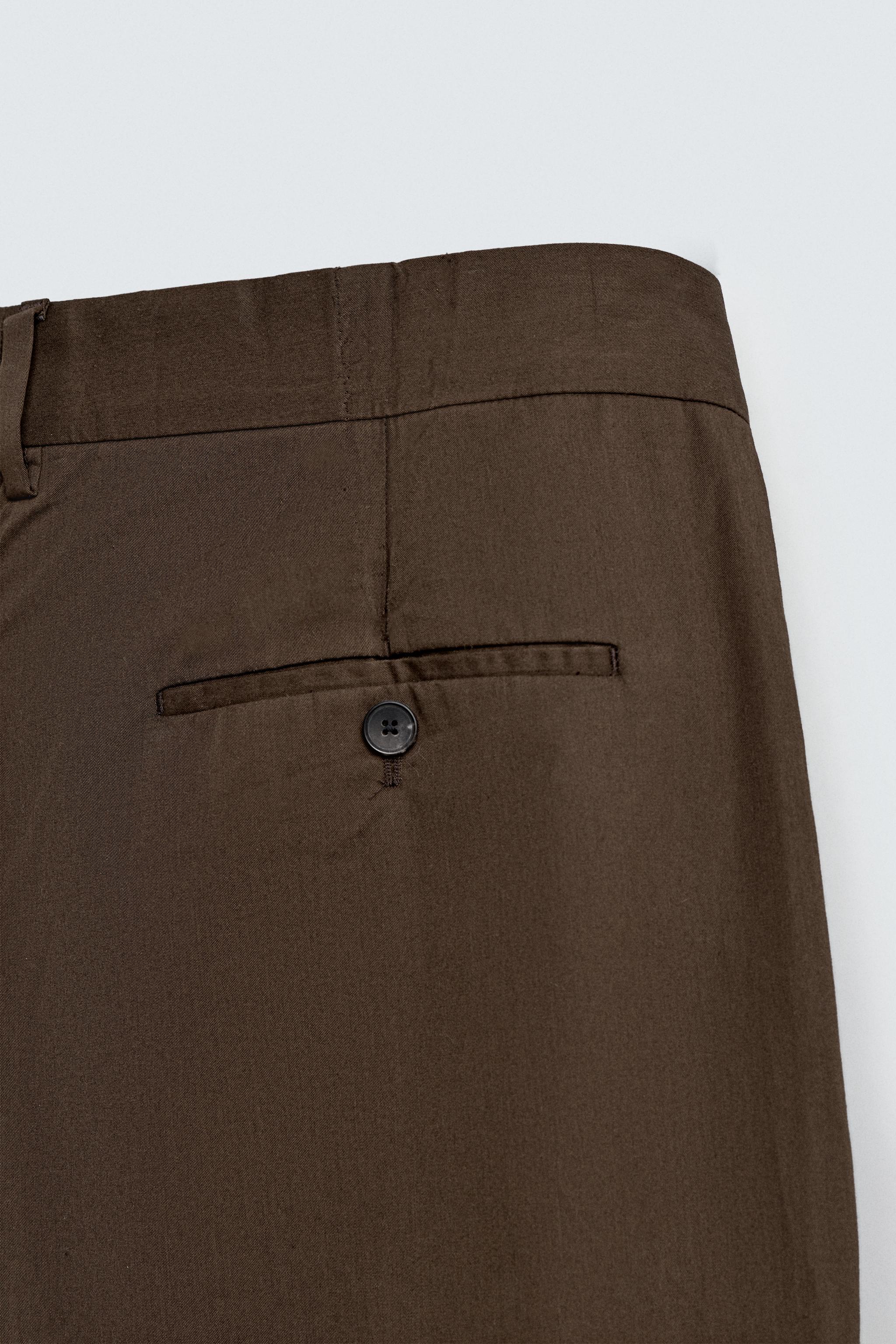 LIMITED EDITION PLEATED CHINO PANTS
