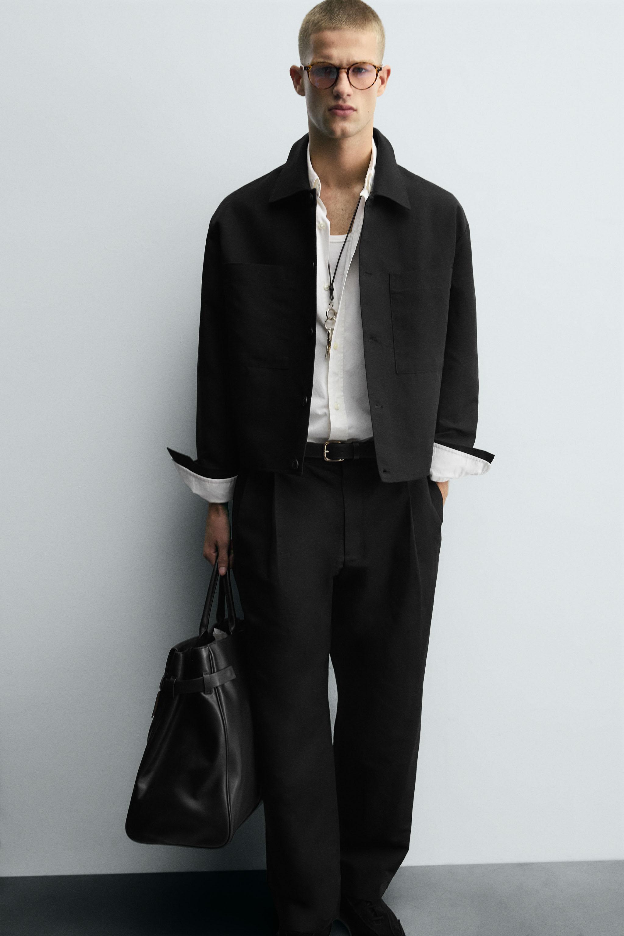 RELAXED FIT PLEATED PANTS