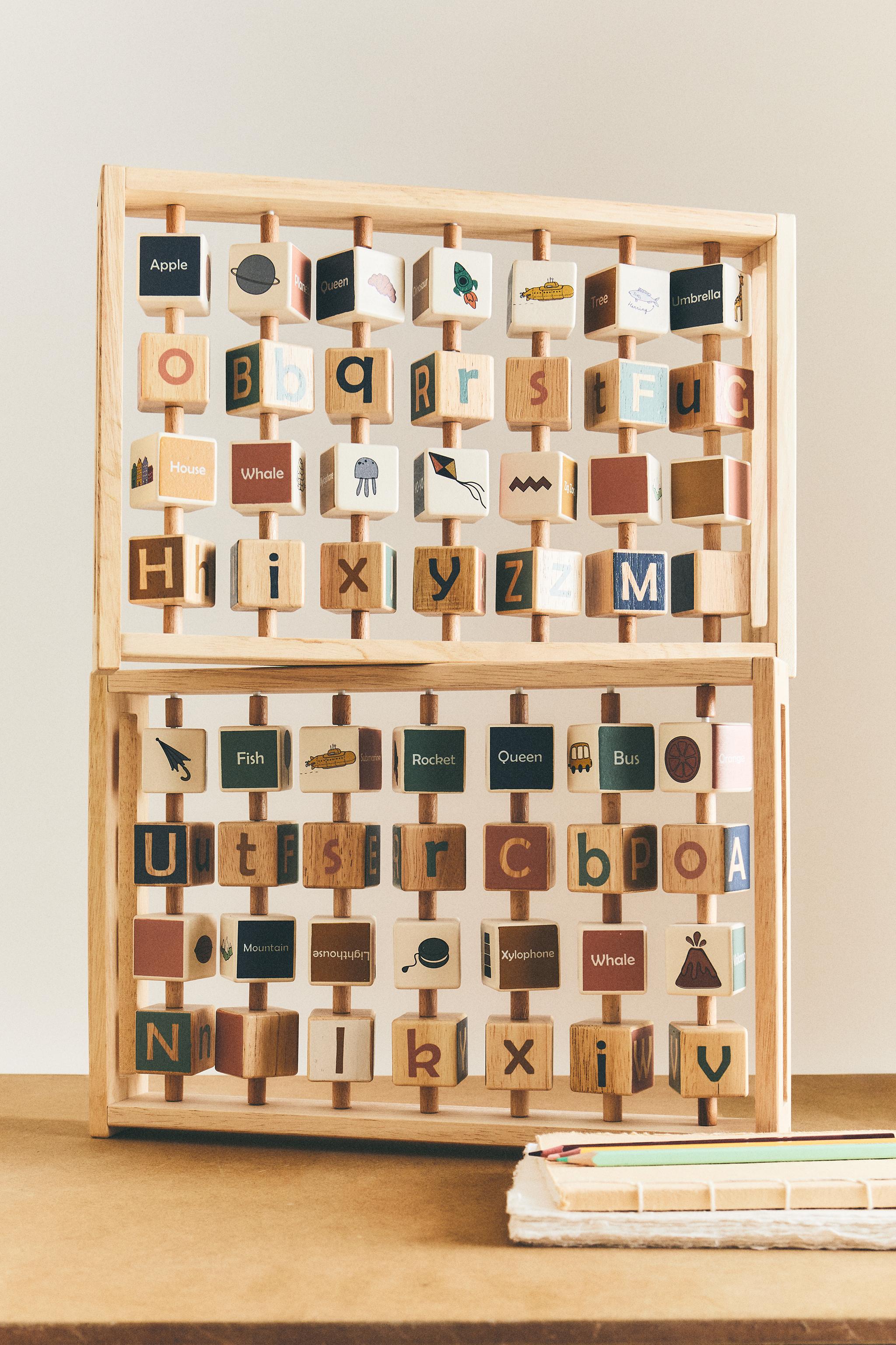 CHILDREN’S WOODEN ALPHABET TOY