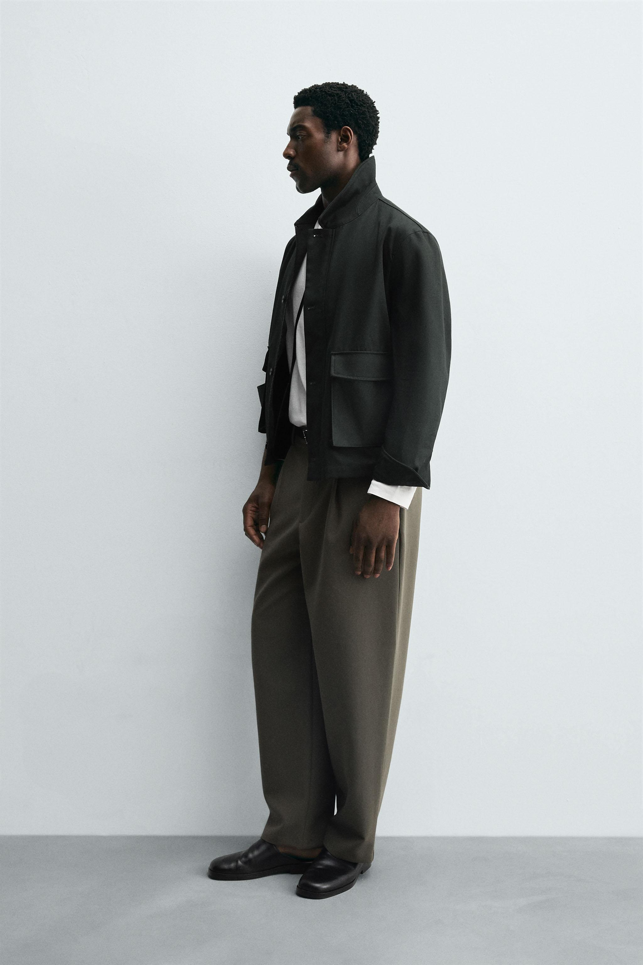 RELAXED FIT PLEATED PANTS