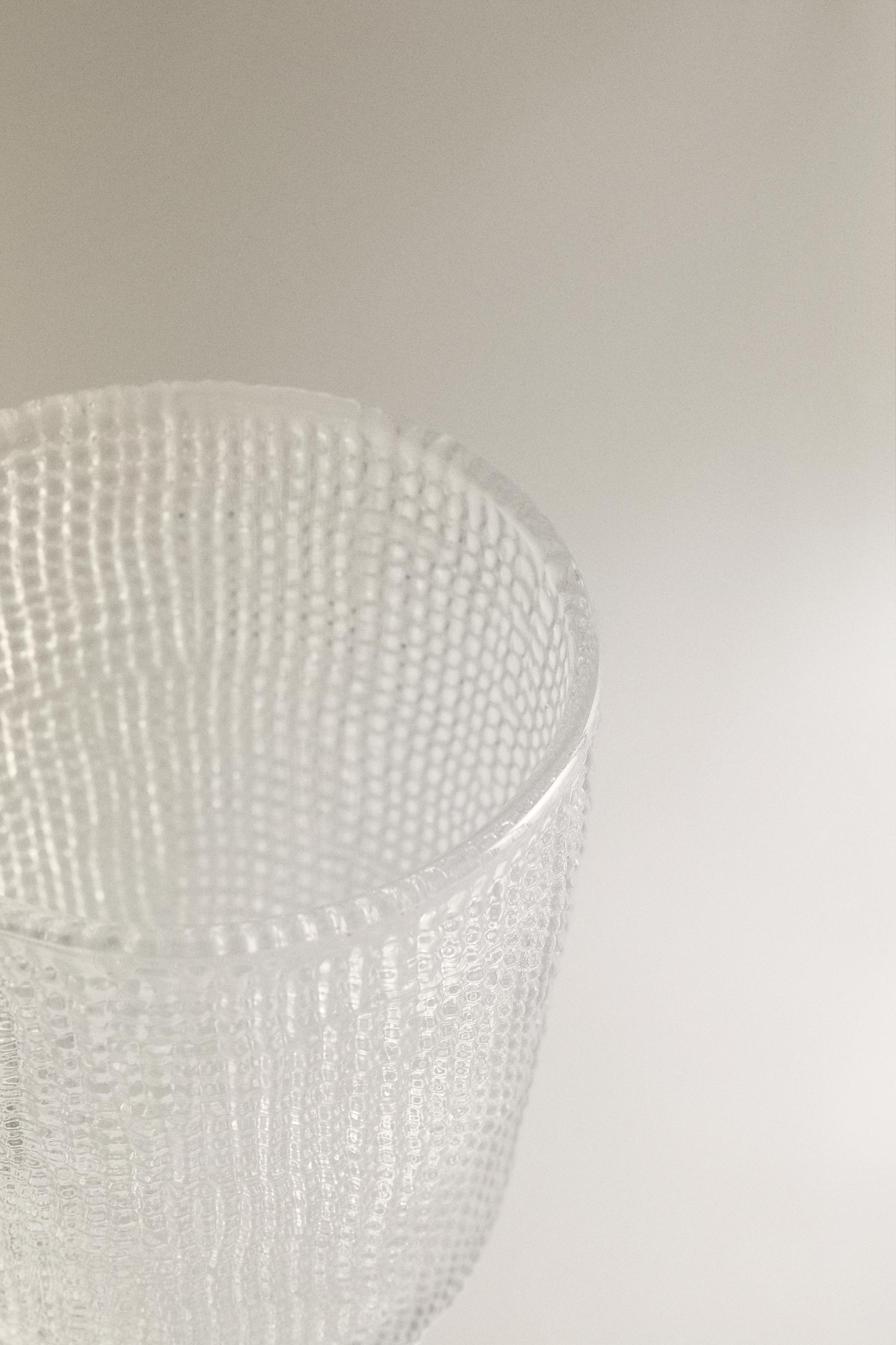 RAISED DESIGN GLASS TUMBLER