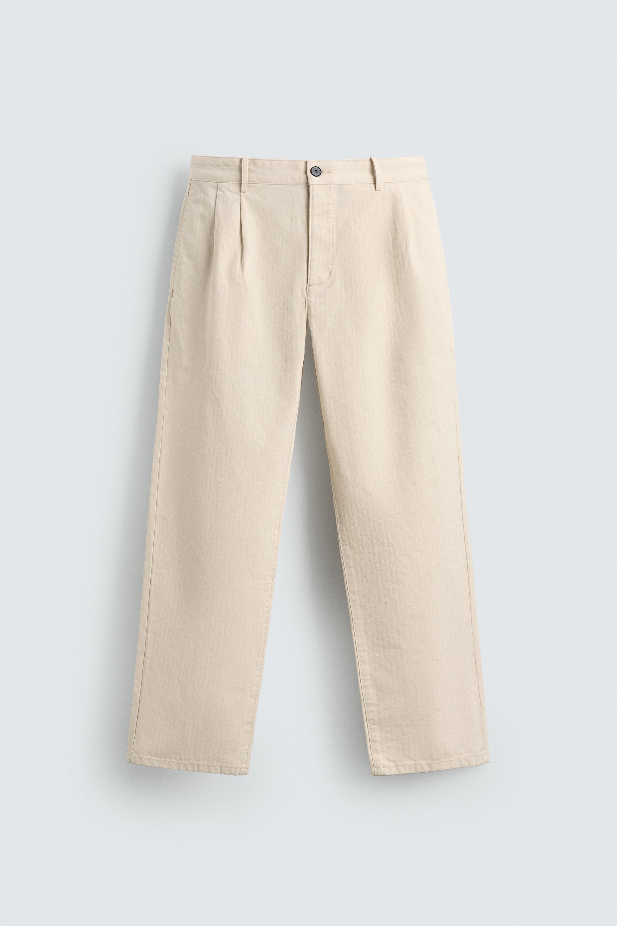 PLEATED HERRINGBONE PANTS