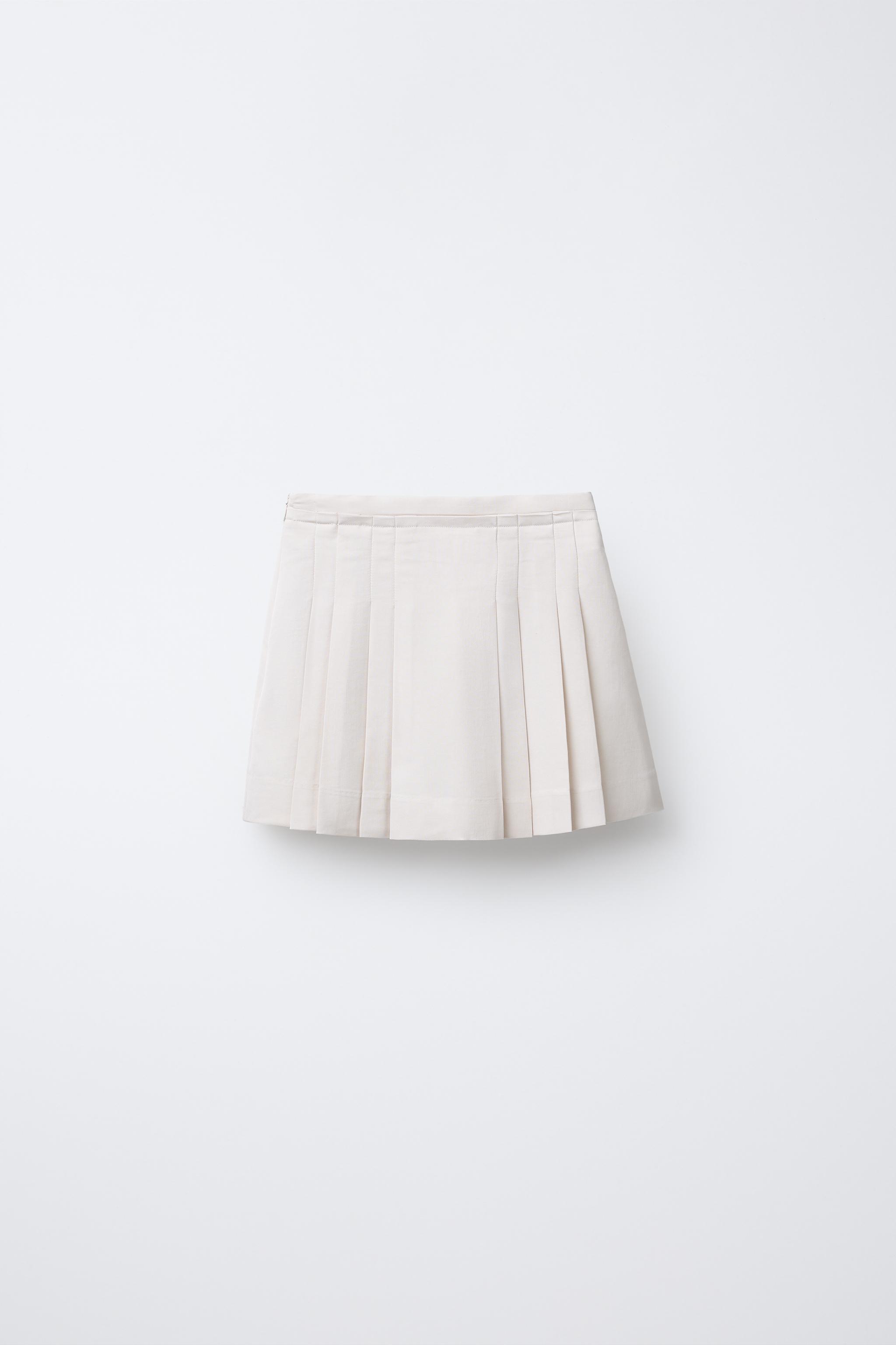 FLOWY PLEATED SKIRT
