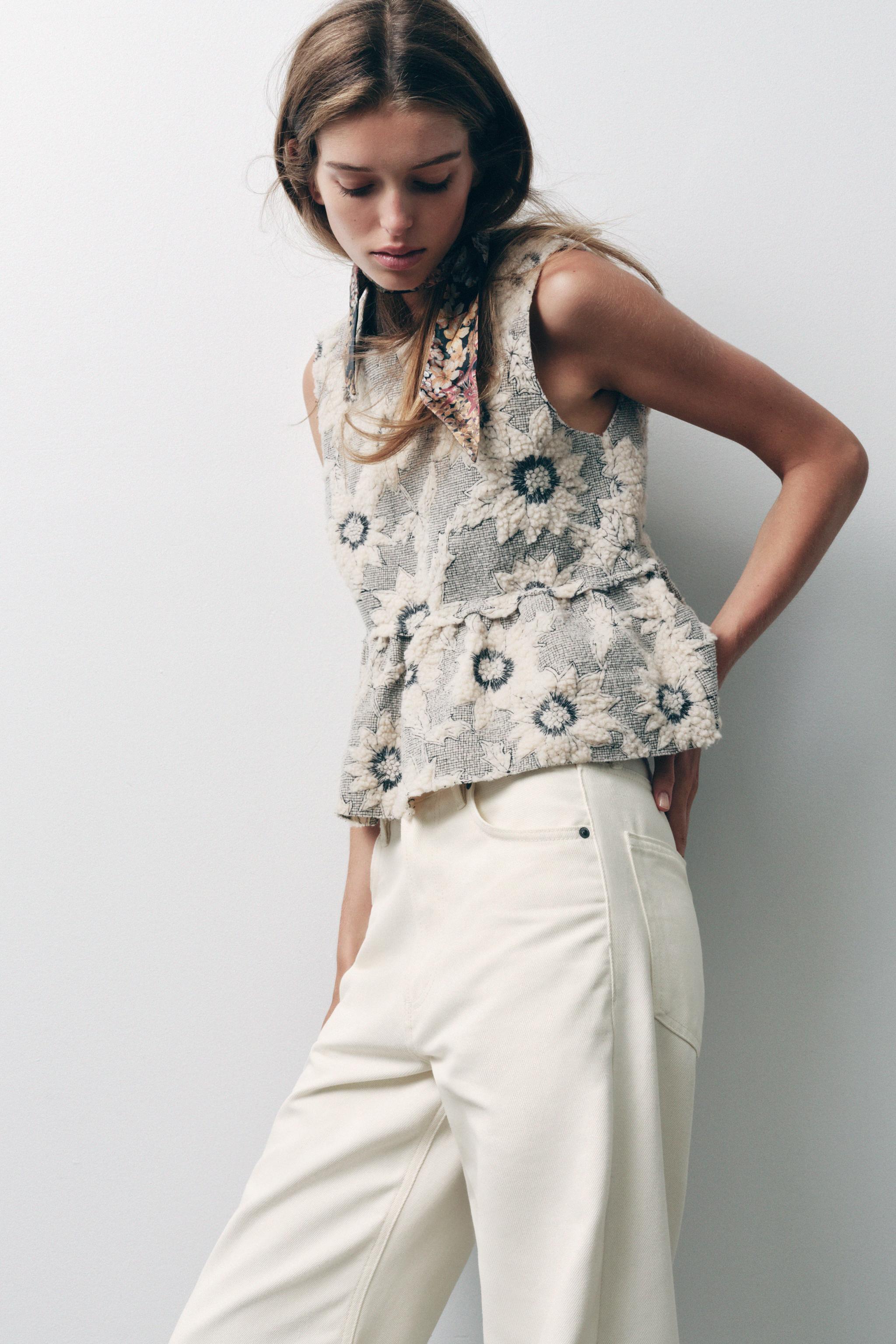 FLORAL TEXTURED KNIT PEPLUM TOP