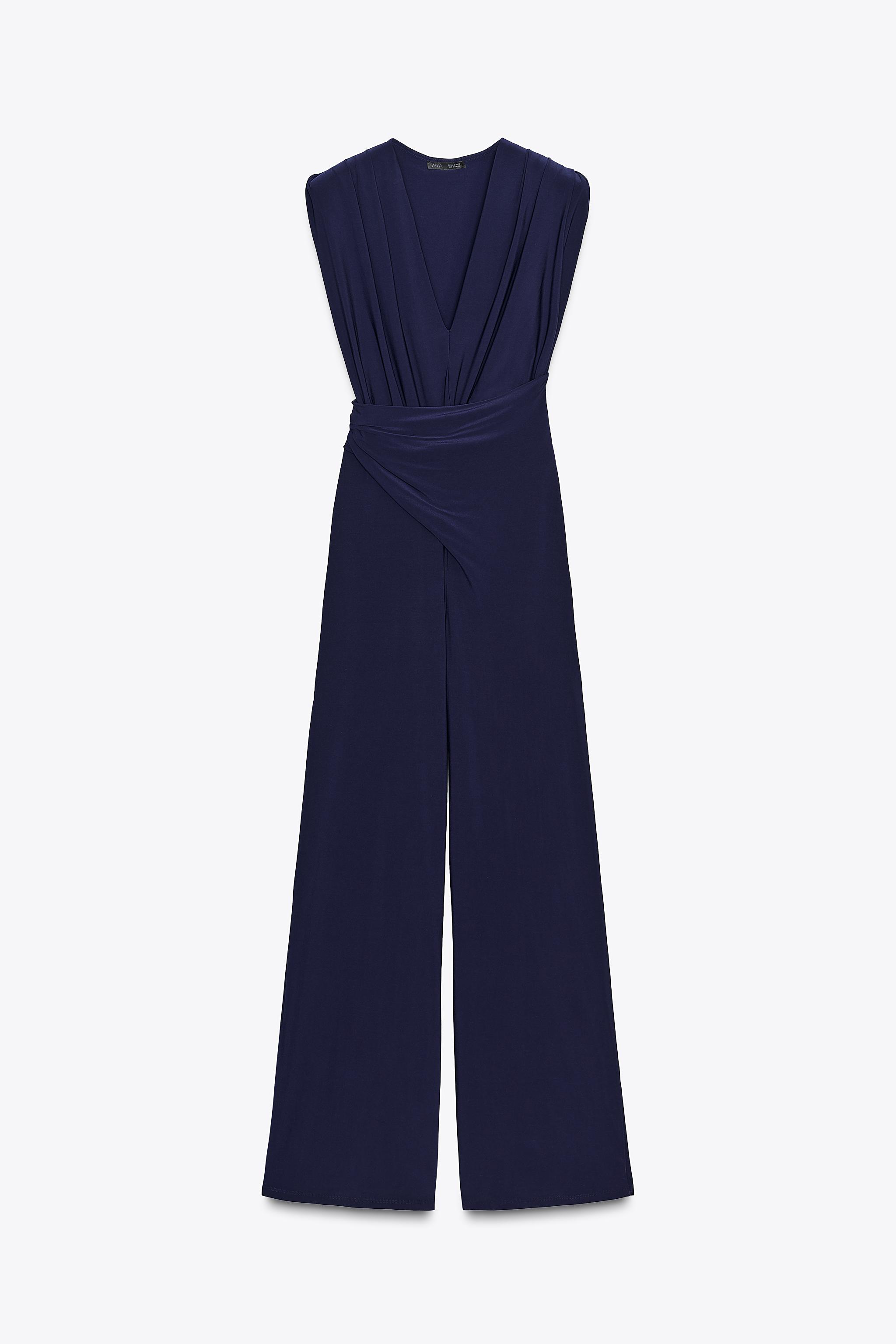 LONG DRAPED SHOULDER PAD JUMPSUIT