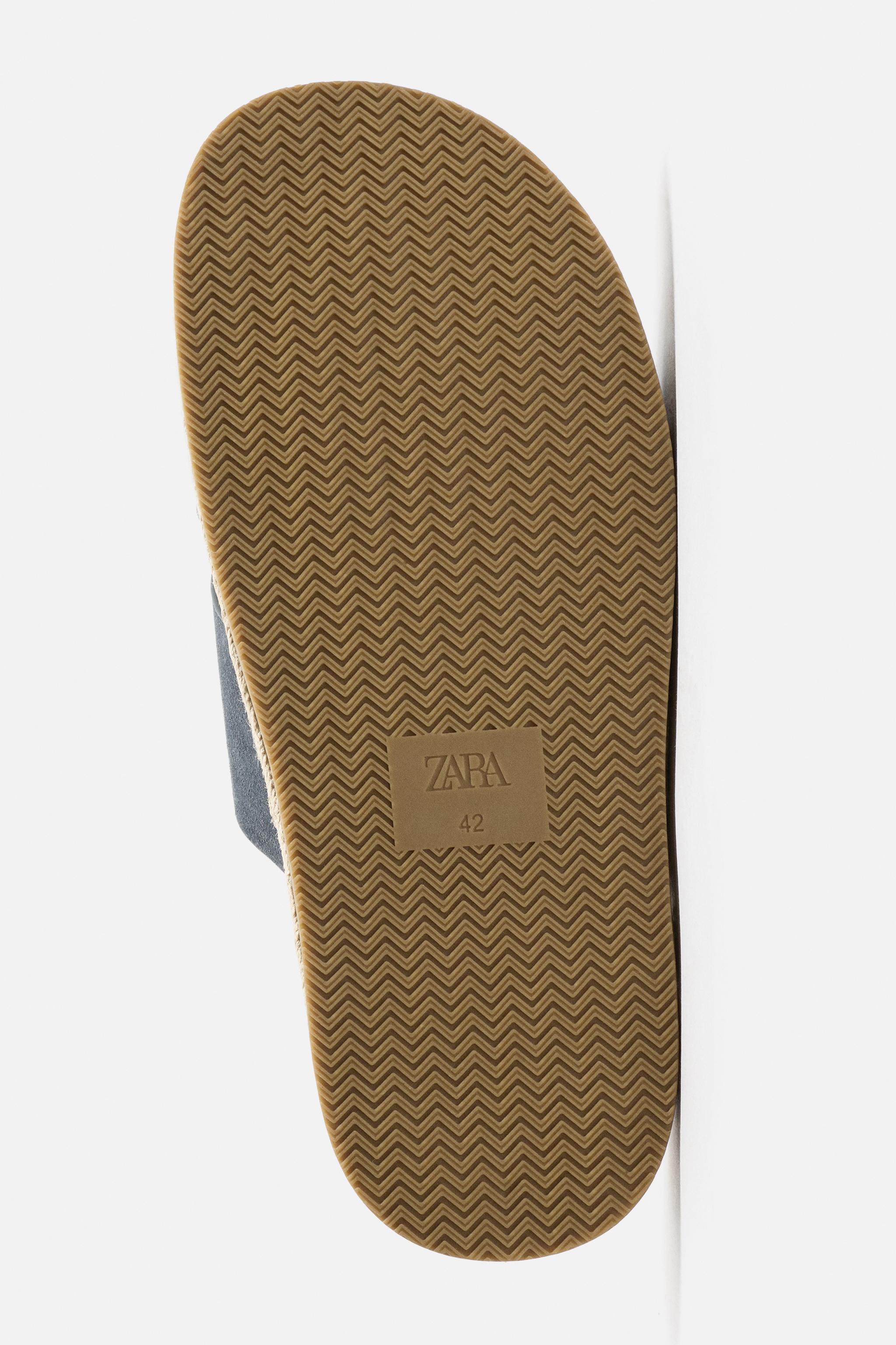 CROSSED LEATHER SANDALS