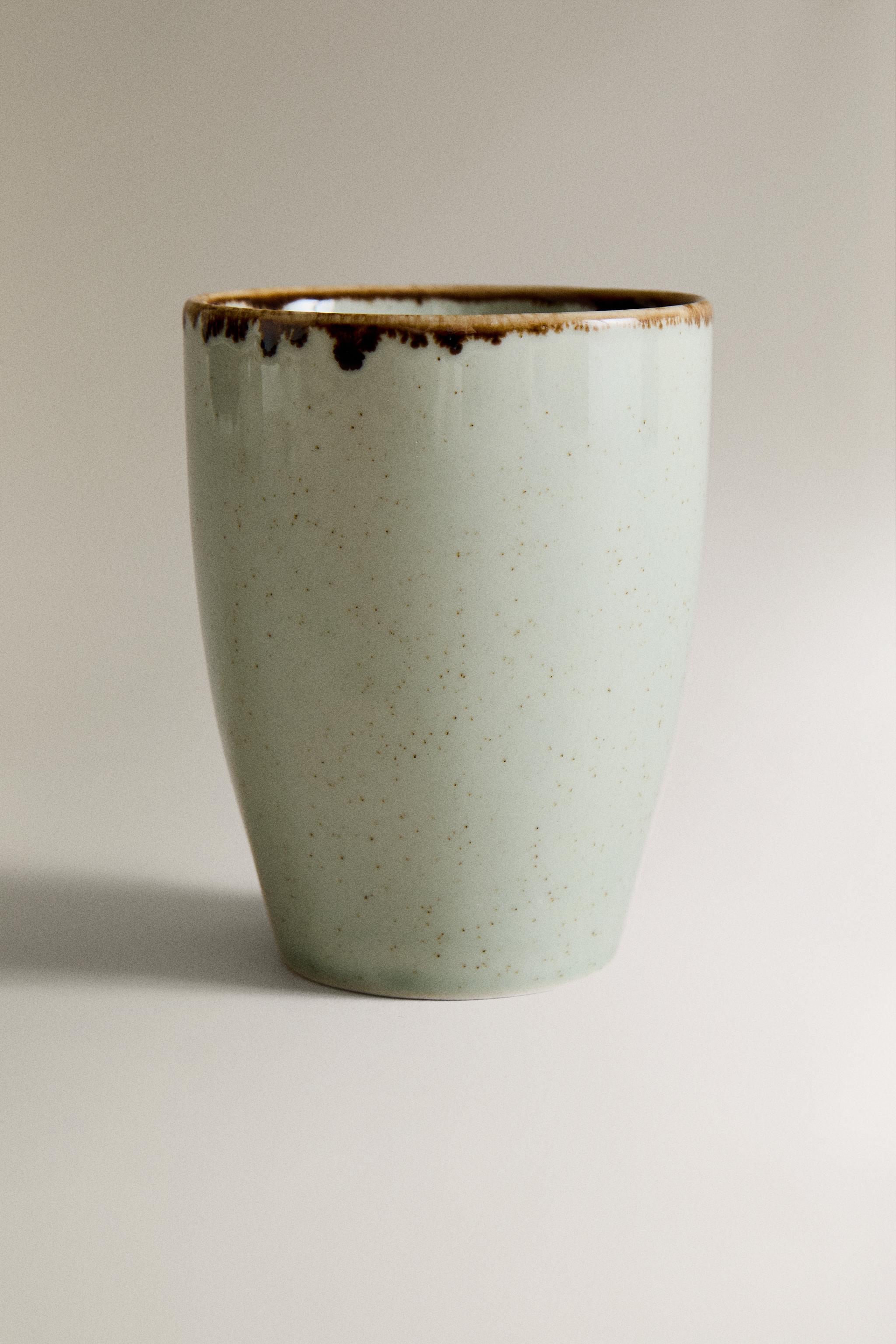 PORCELAIN MUG WITH ANTIQUE FINISH RIM
