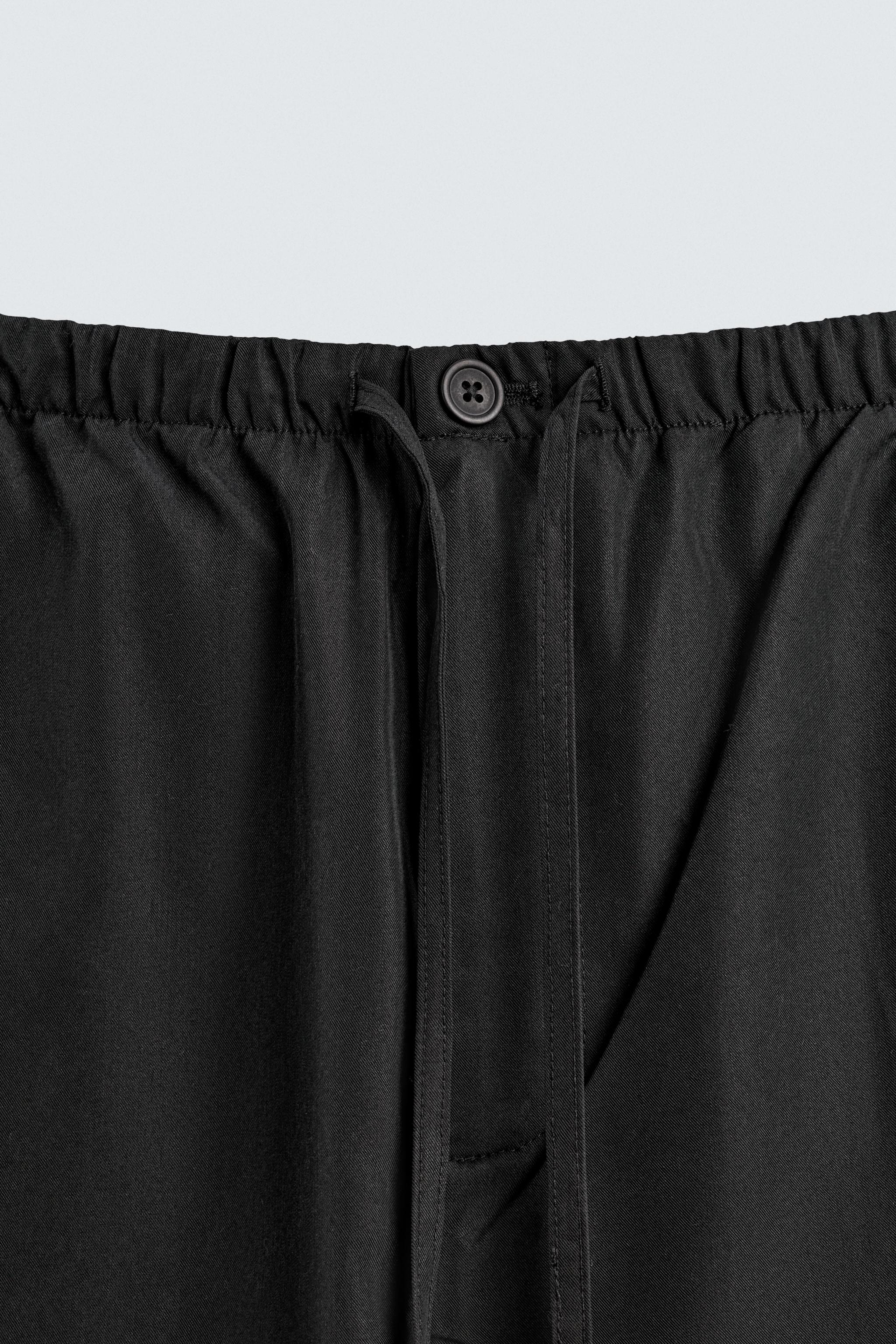 RELAXED FIT FLOWY PANTS