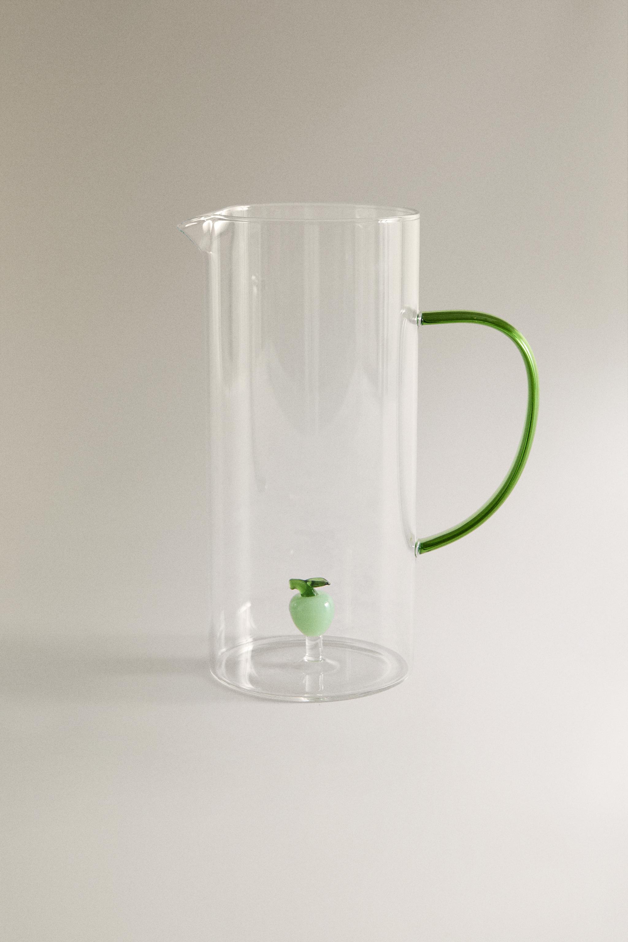 GLASS PITCHER WITH HANDLE AND APPLE DETAIL