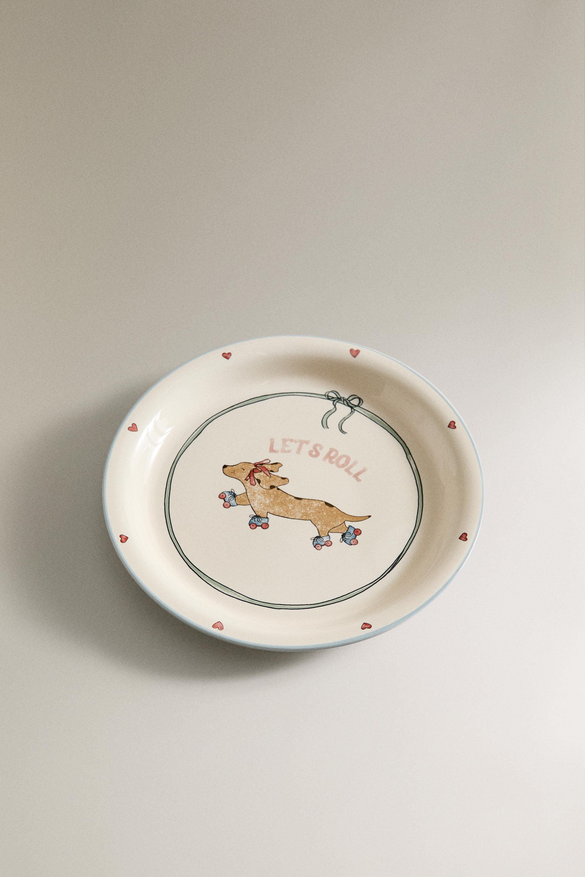 CHILDREN'S CERAMIC SKATING DOG PLATE