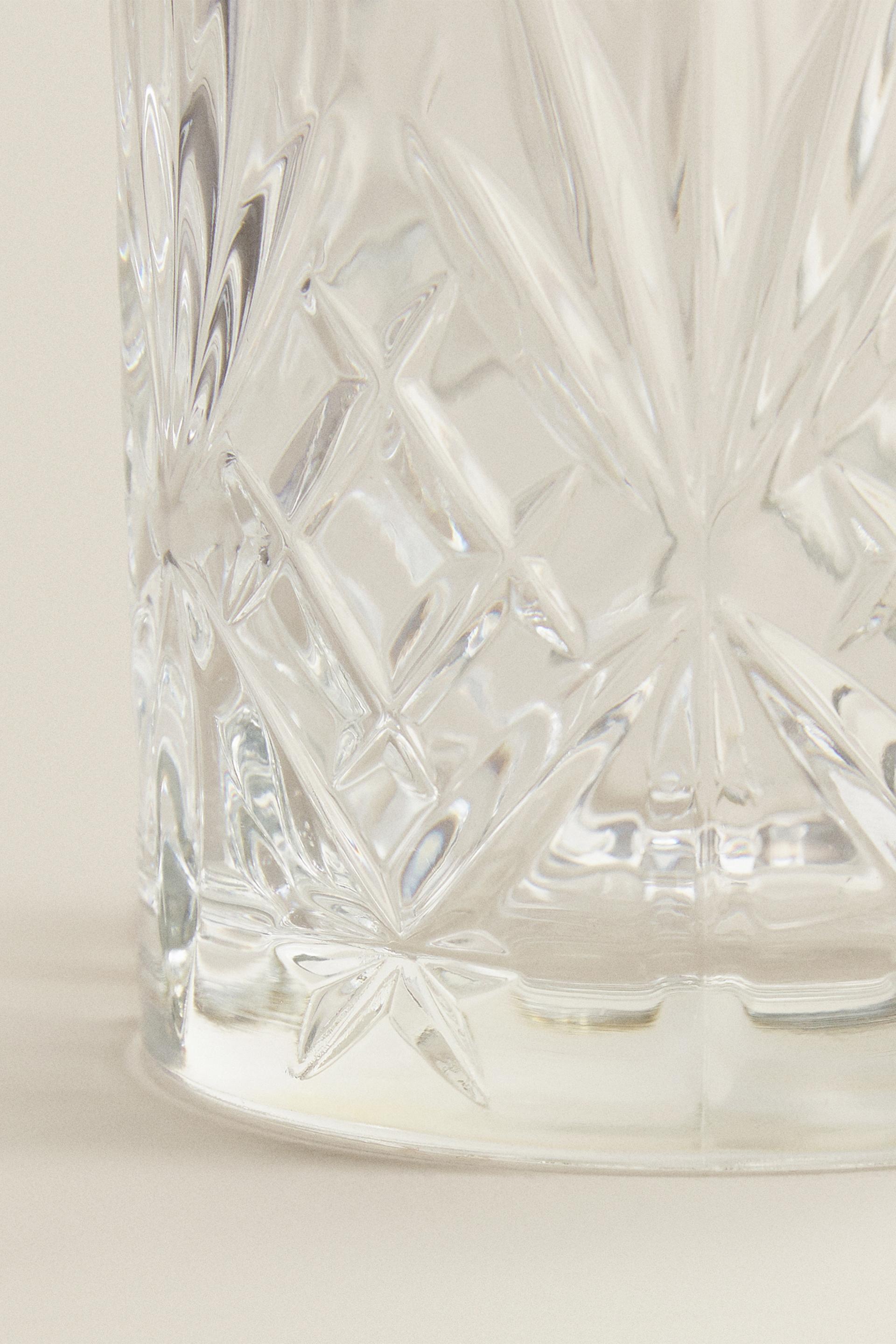 CRYSTALLINE TUMBLER WITH RAISED DESIGN