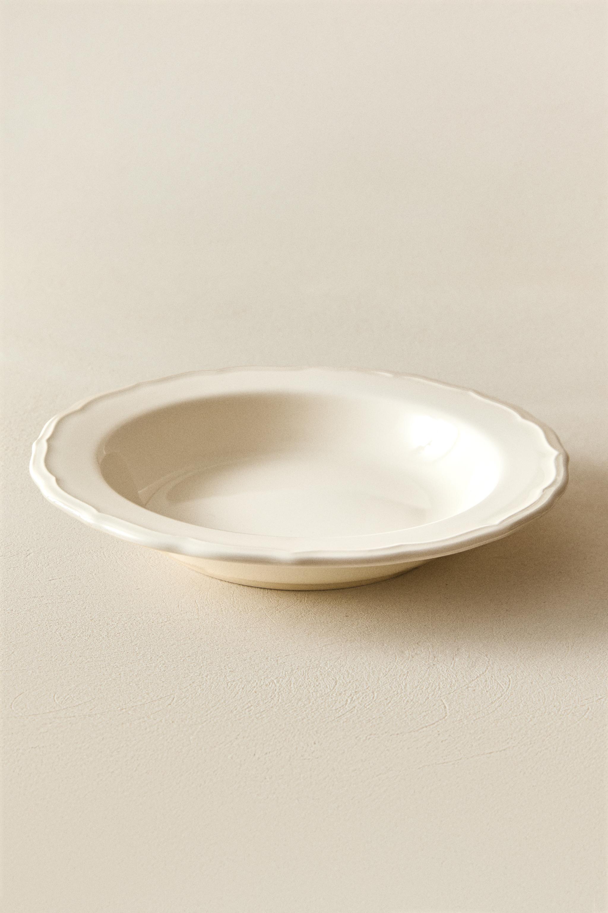 EARTHENWARE SOUP PLATE WITH RAISED-DESIGN EDGE
