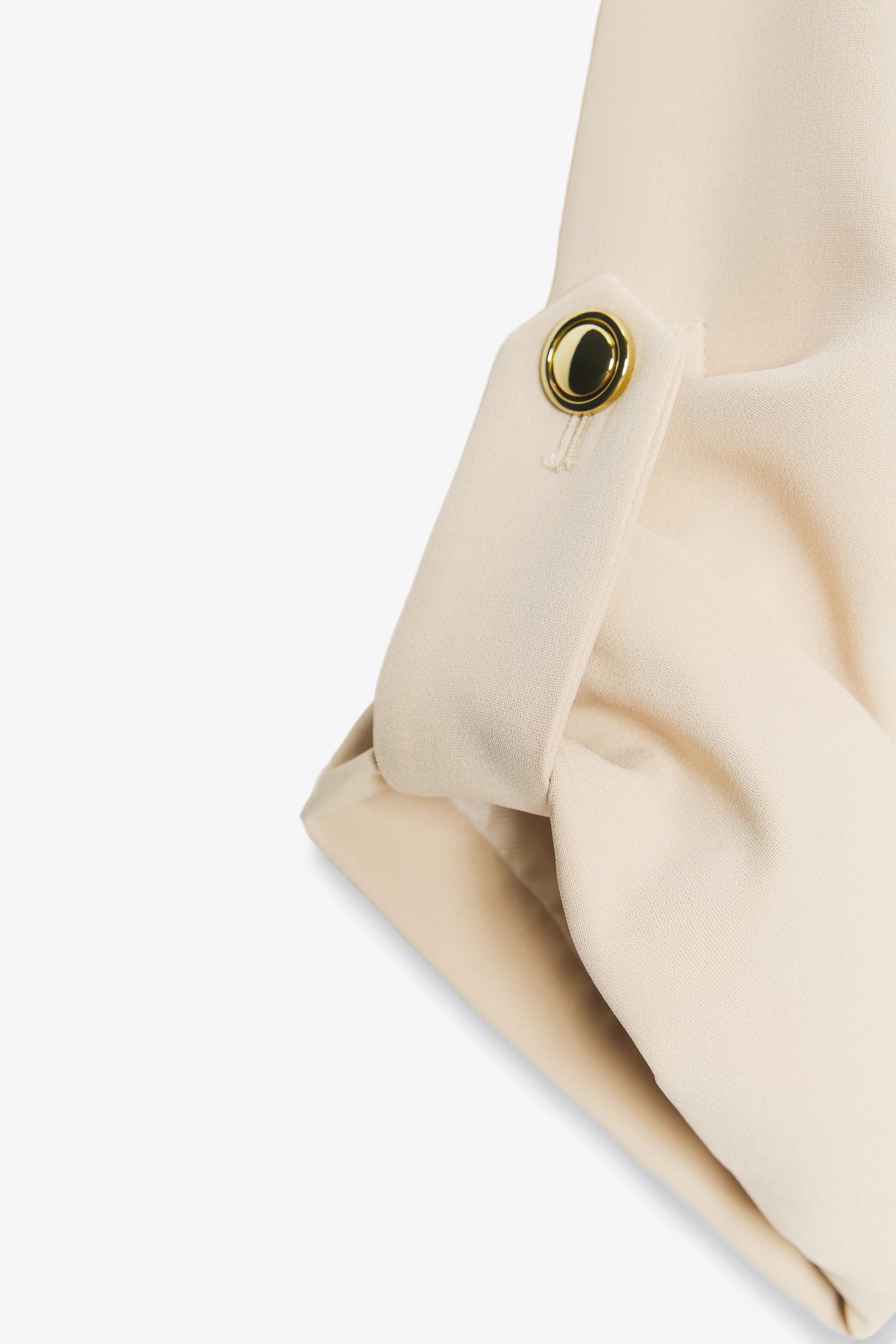 DOUBLE BREASTED BLAZER WITH TABBED SLEEVES