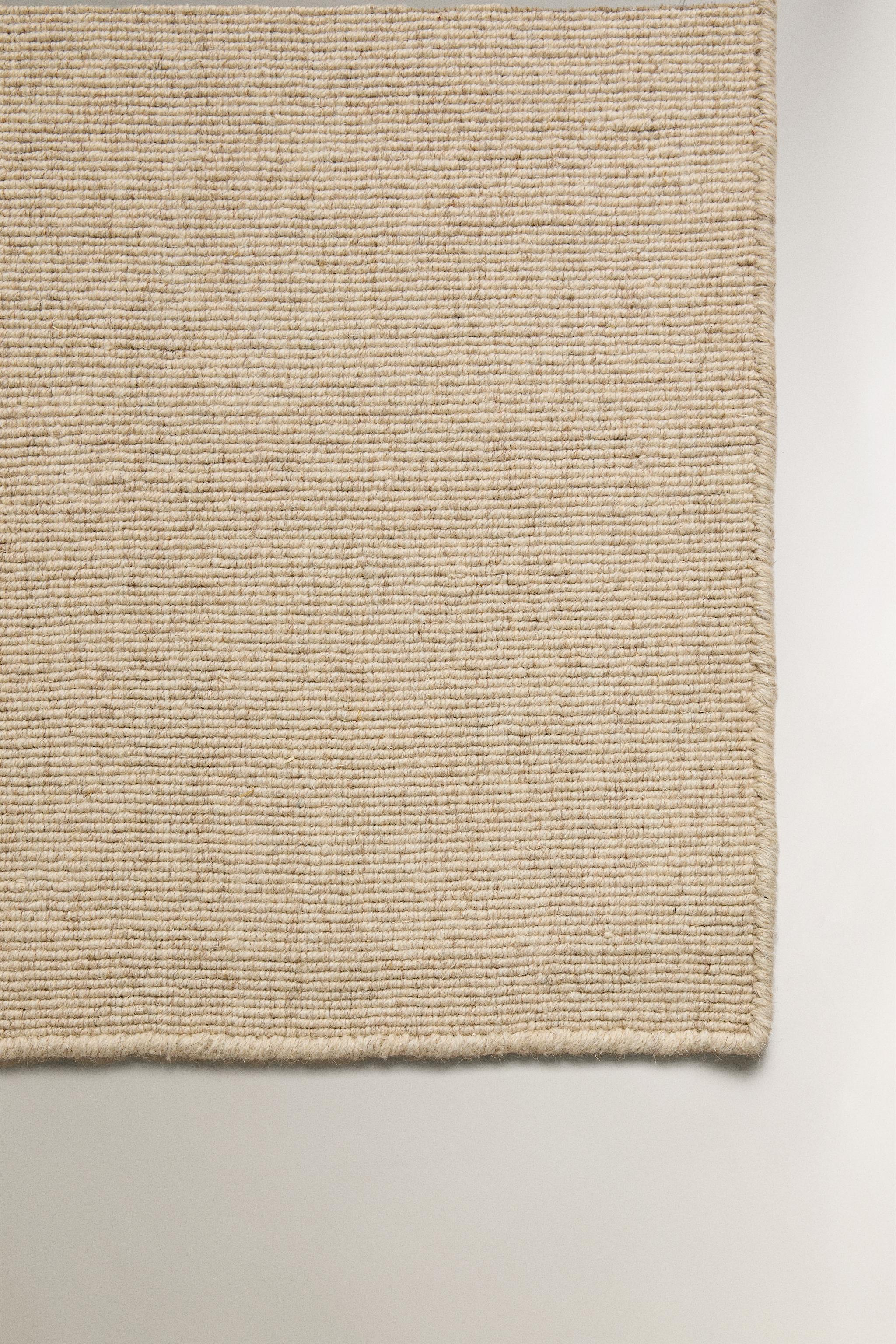 WOOL AREA RUG WITH SCALLOPED LINES