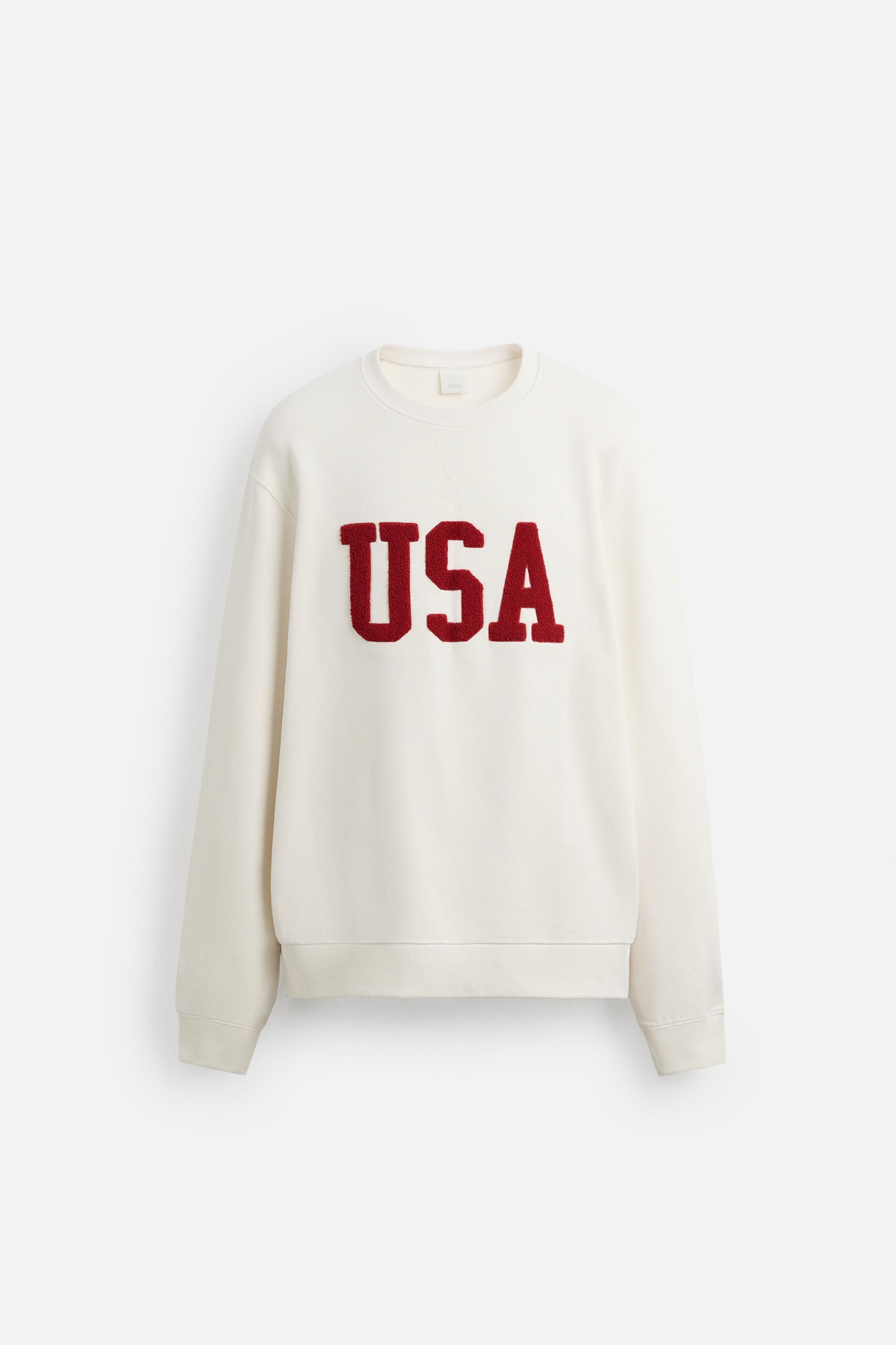 TEXTURED PATCH SWEATSHIRT