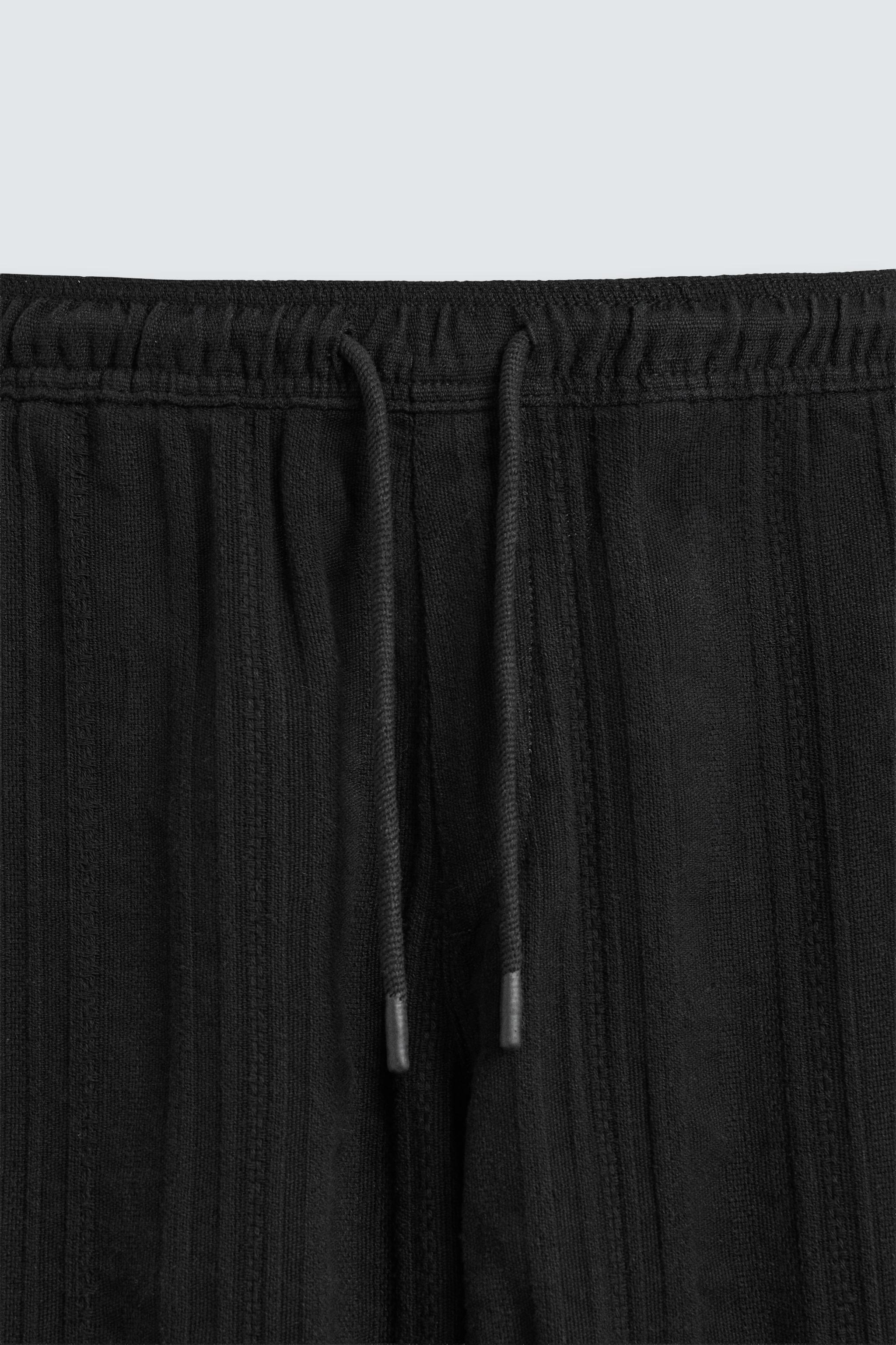 TEXTURED RELAXED FIT PANTS